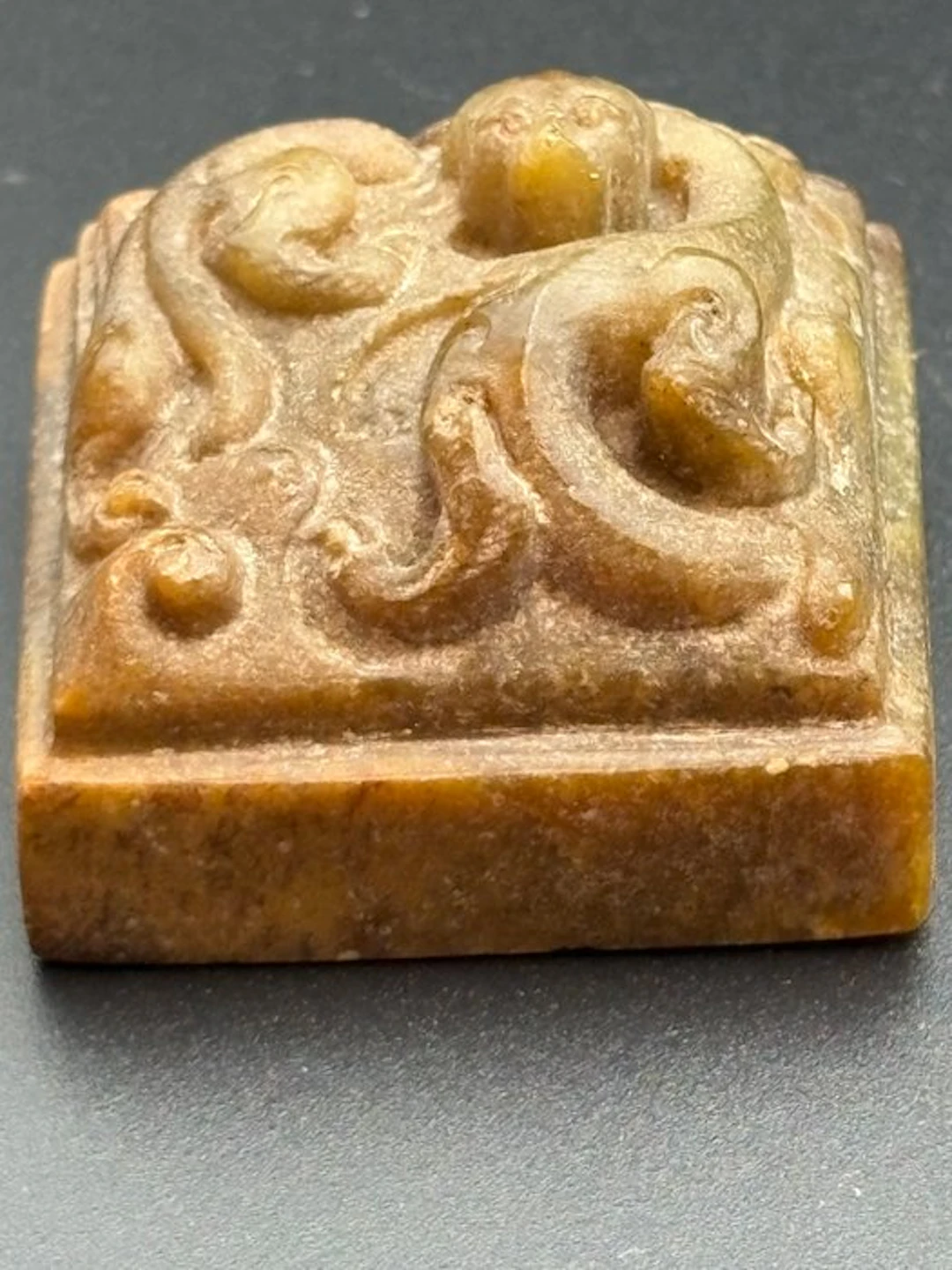 Ancient Chinese jade A yellow jade square seal with a Chi...