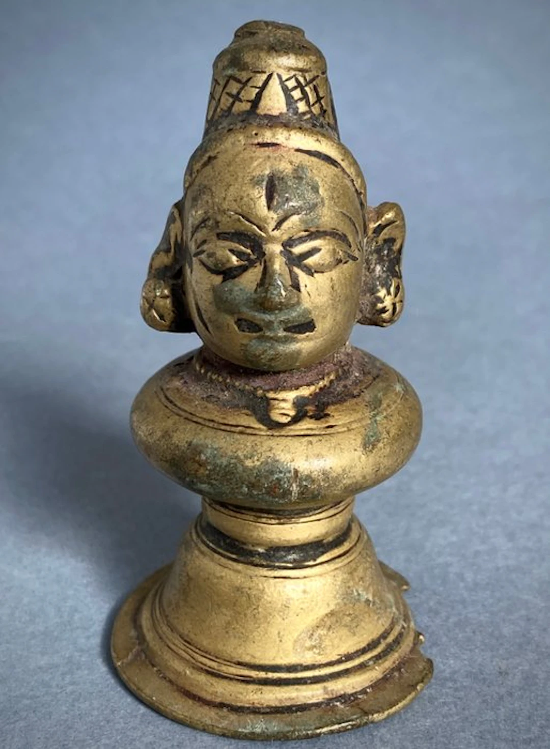 Mukha-liṅga of Śiva in bronze
