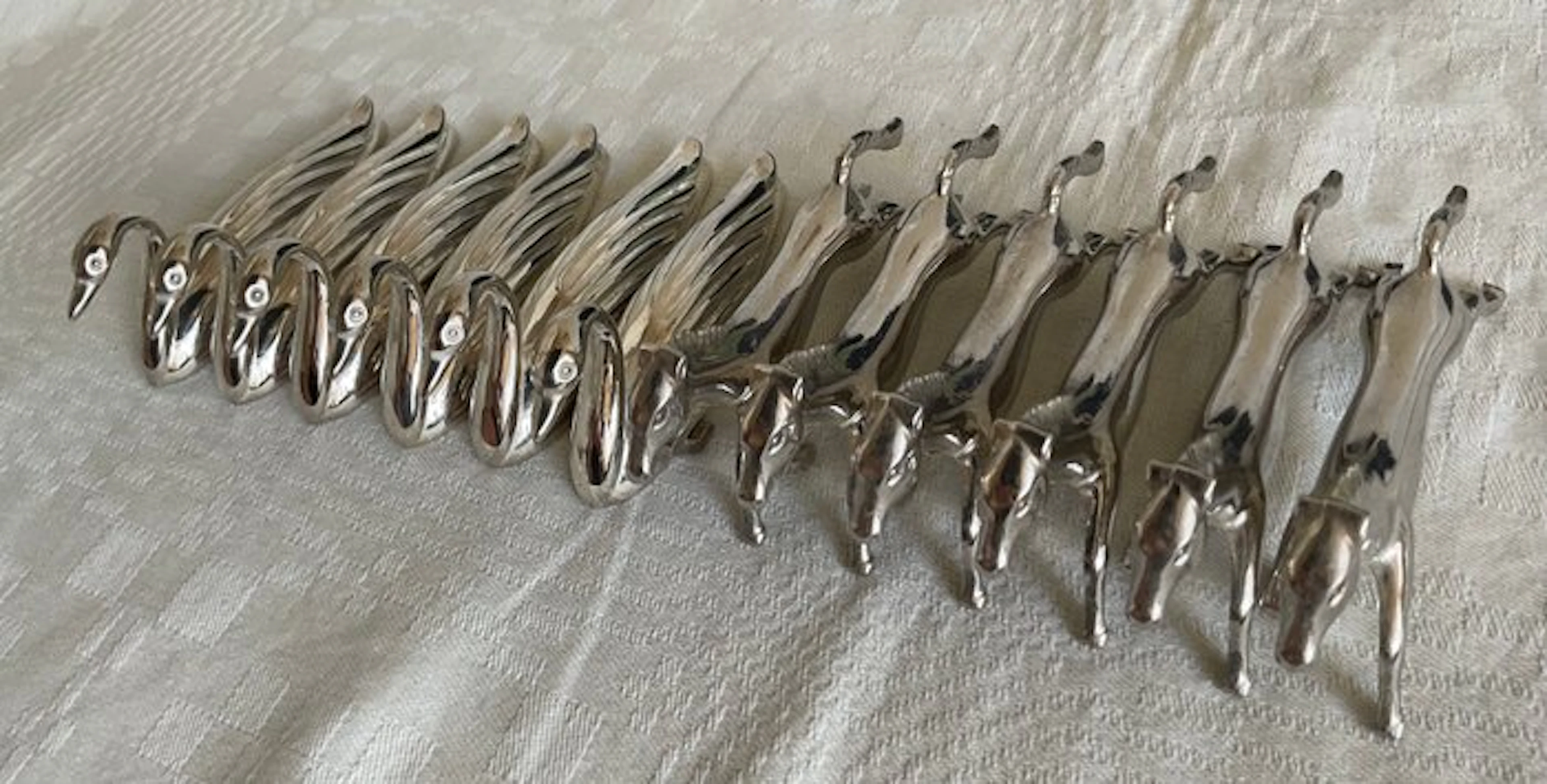 Knife rest (12) - Messenleggers renpaarden en zwanen - Silverplated