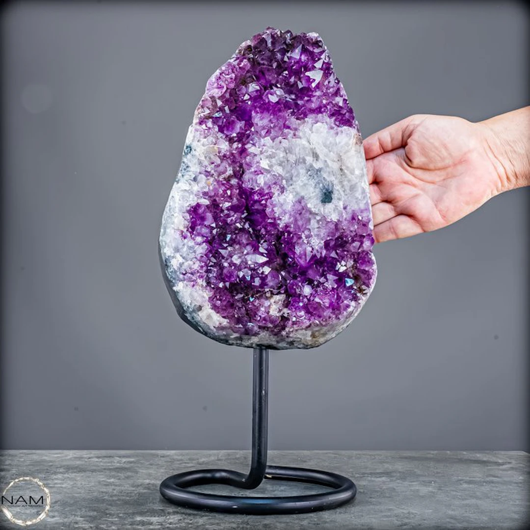 Stunning amethyst on a stand — majestic crystal energy in an elegant display