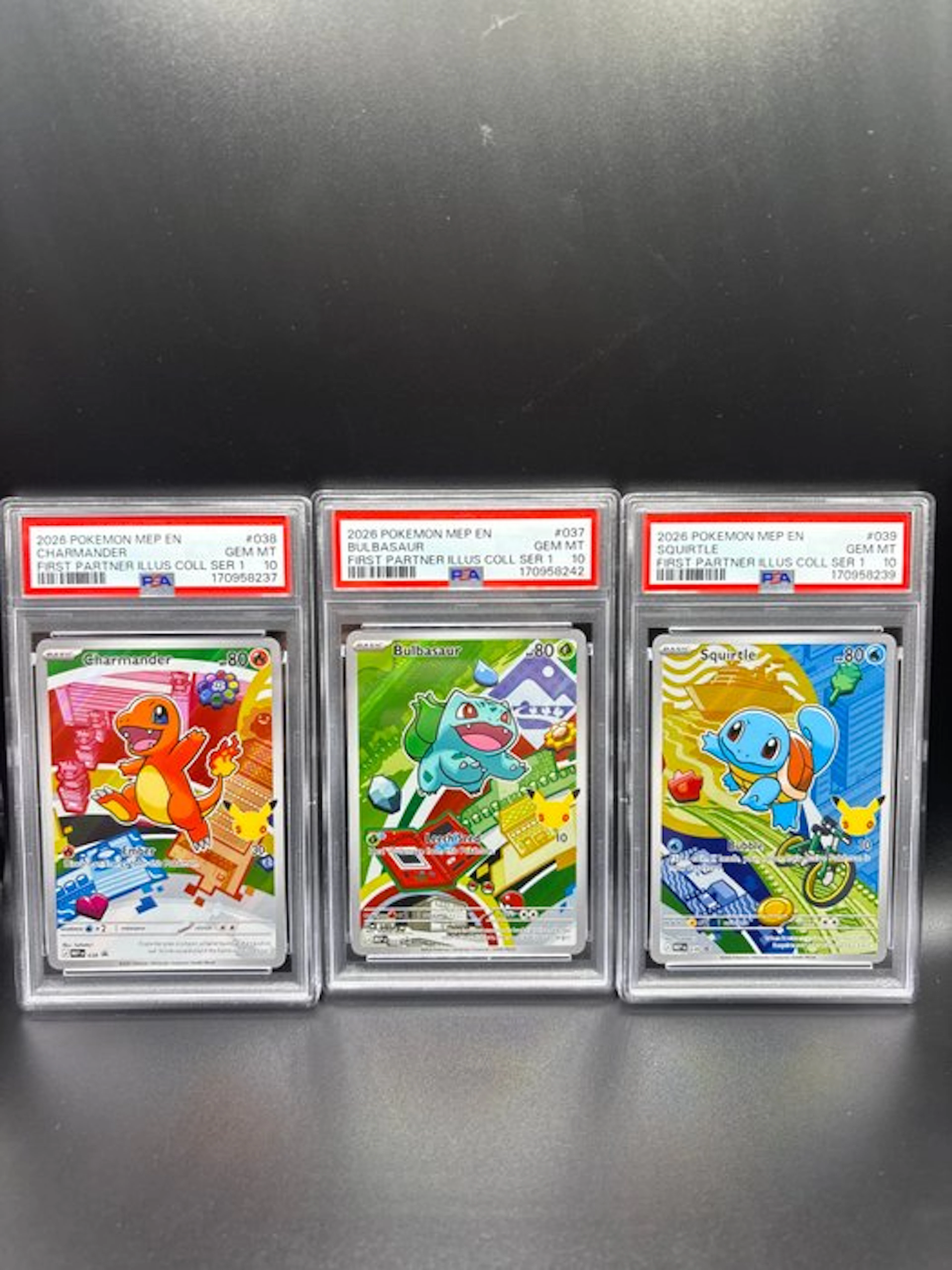 Pokémon - 3 Graded card Charmander Squirtle & Bulbasaur...