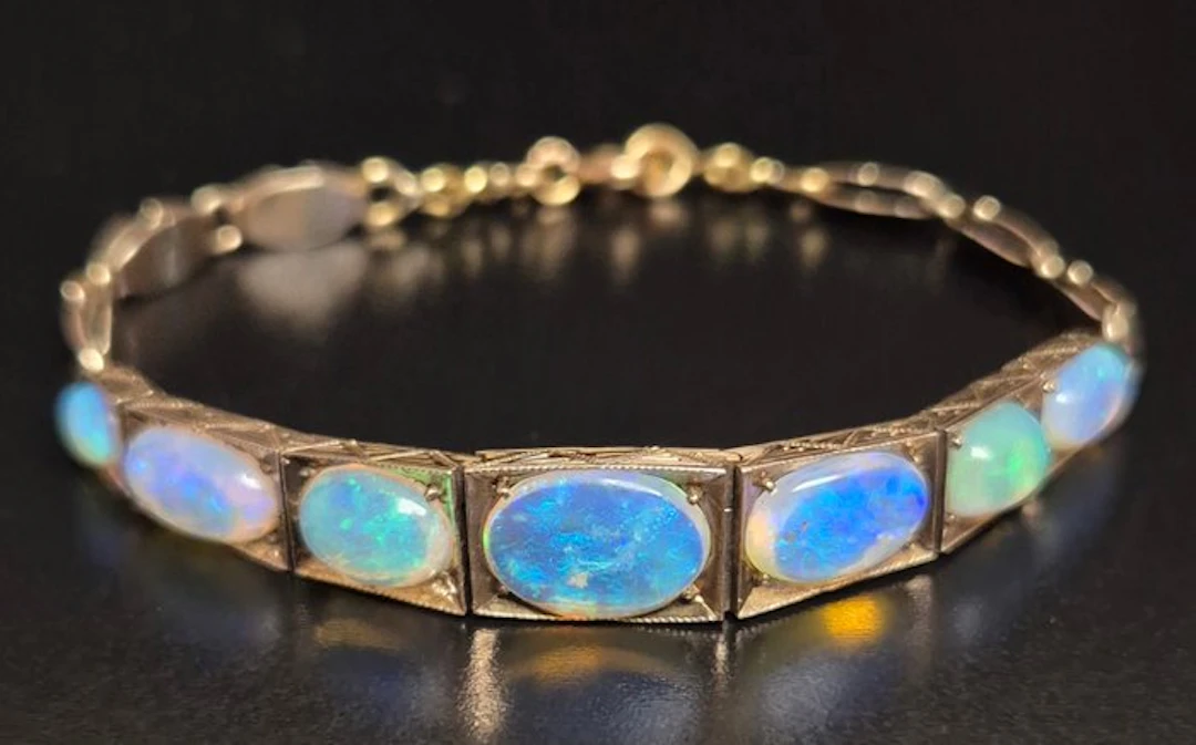 No reserve price - Bracelet - 9 kt. Yellow gold - 6.95ct. tw. Opal - Debut 20th