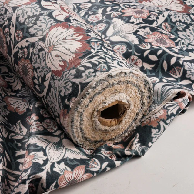 Cotton upholstery fabric with an ornamental floral pattern