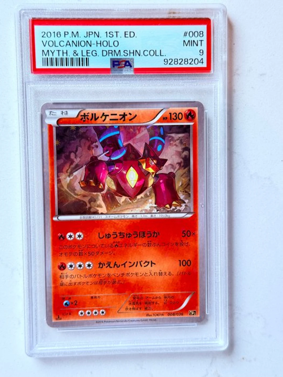 Pokémon - 1 Graded card - Volcanion 008/036 Foil