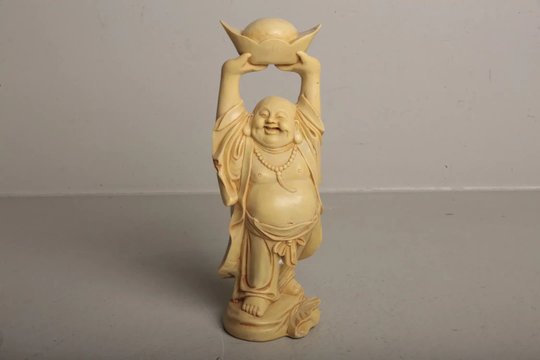 Skulptur- "Buddha hållade över huvudet- Guldgöt", 1900-tal