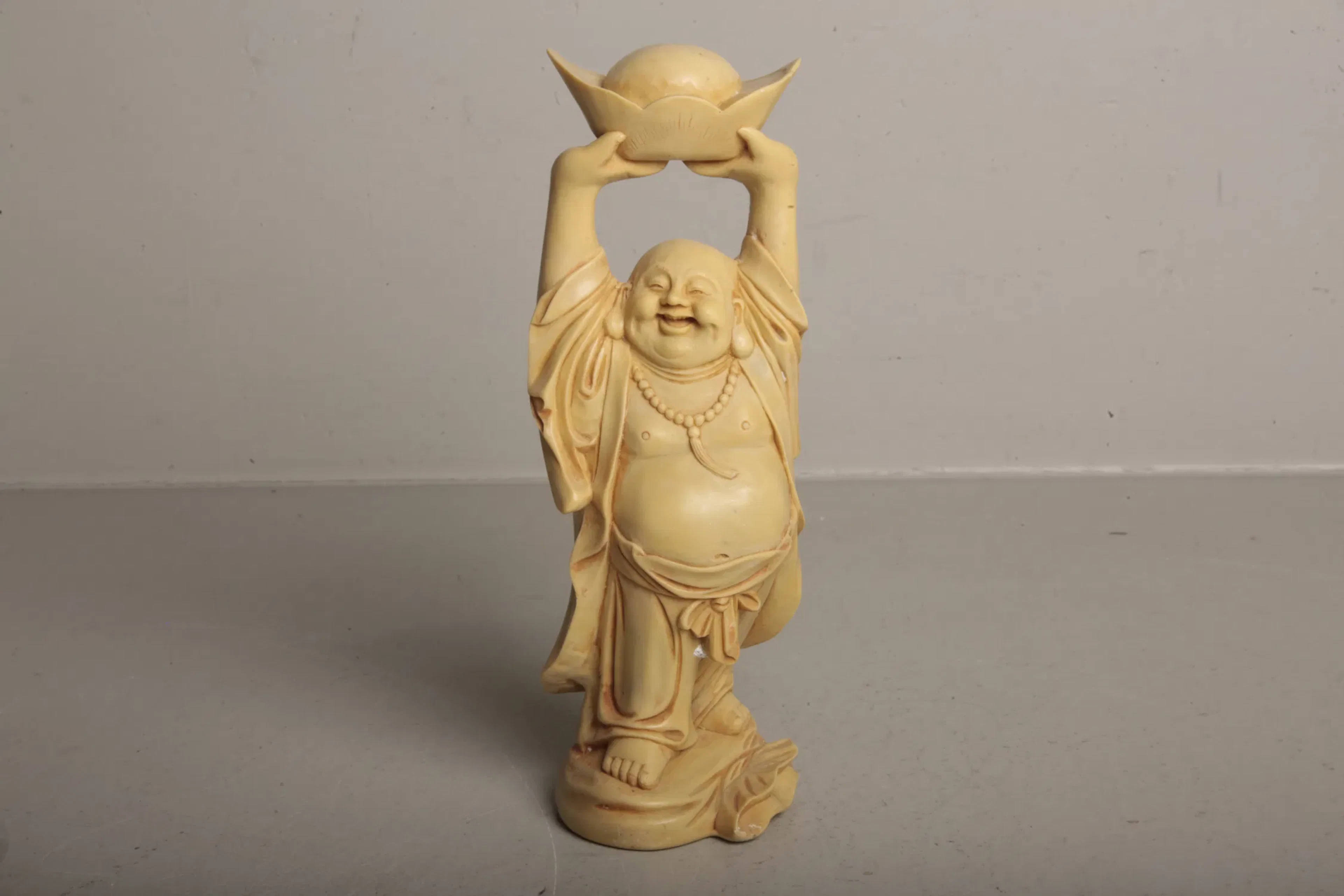 Skulptur- "Buddha hållade över huvudet- Guldgöt", 1900-tal