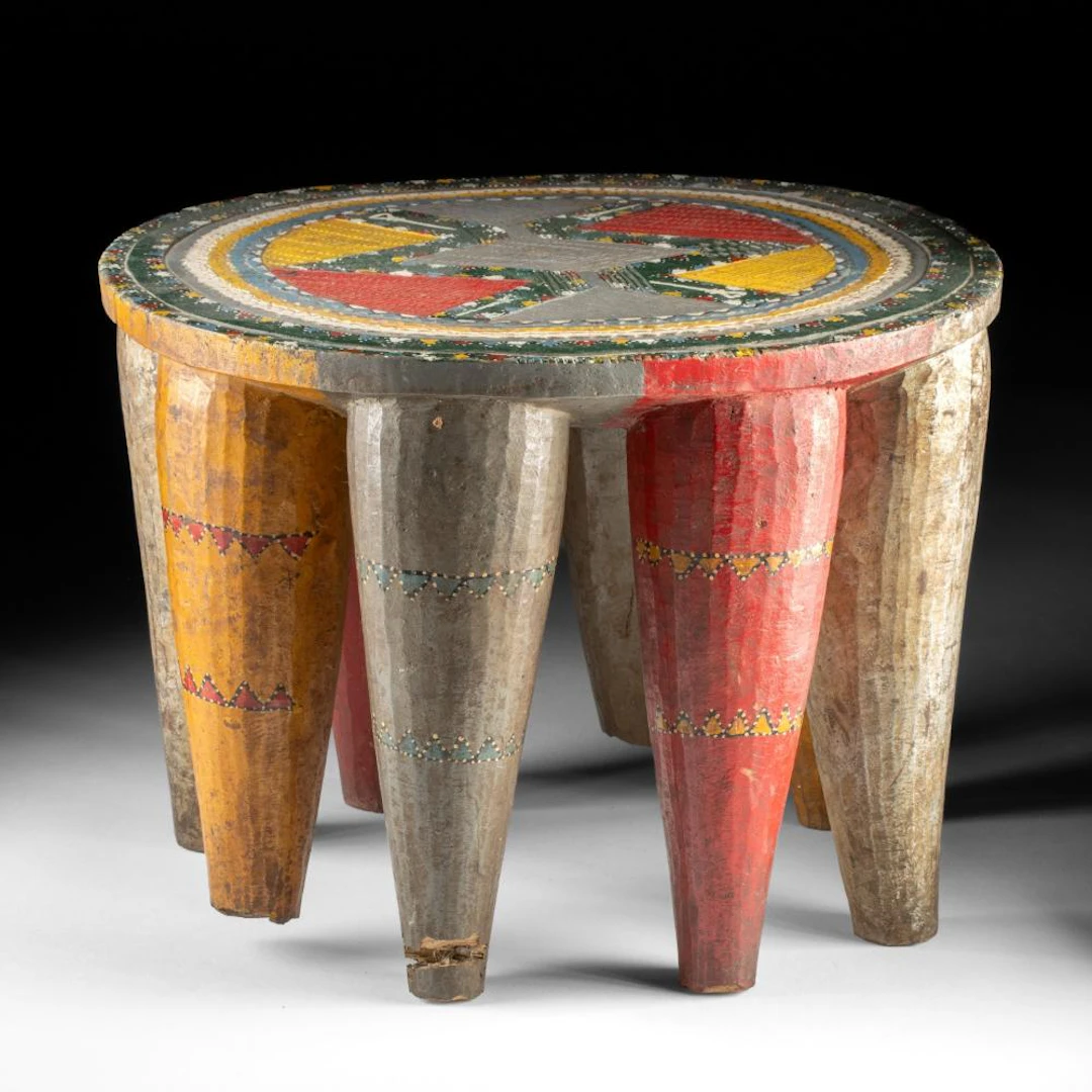 African Nupe Polychrome Carved Wood Round Stool with Conical Legs