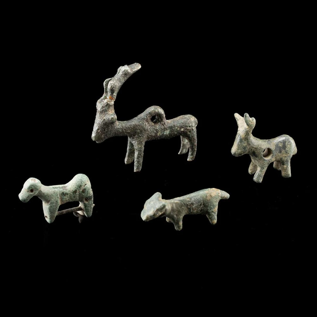Four Luristan Zoomorphic Amulet Figures