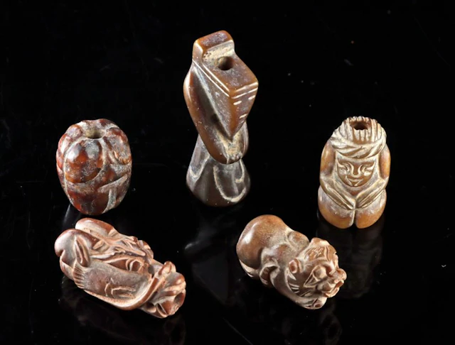 Five Chinese Carved Stone Charm Beads