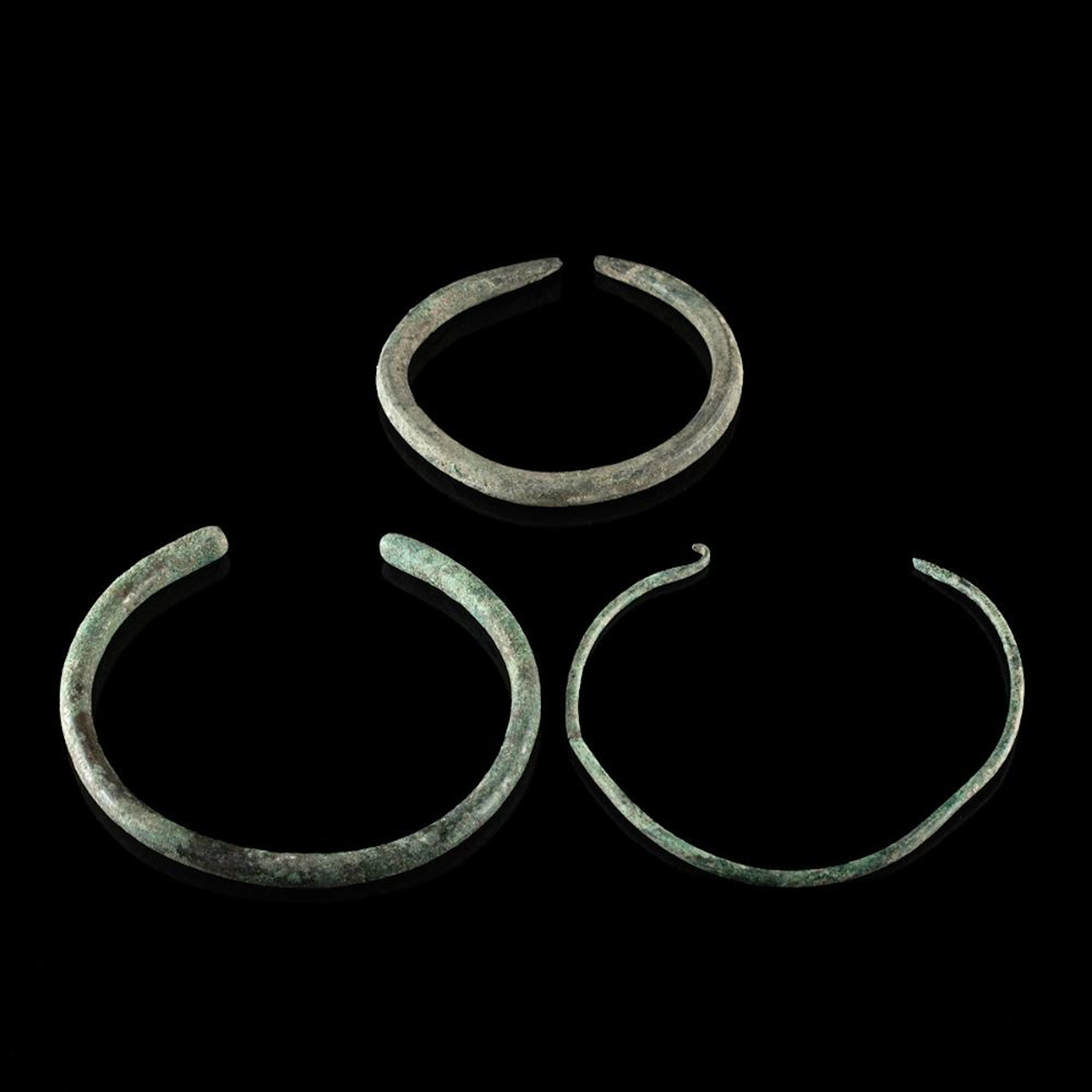 Three Luristan Copper & Bronze Bangles or Torques