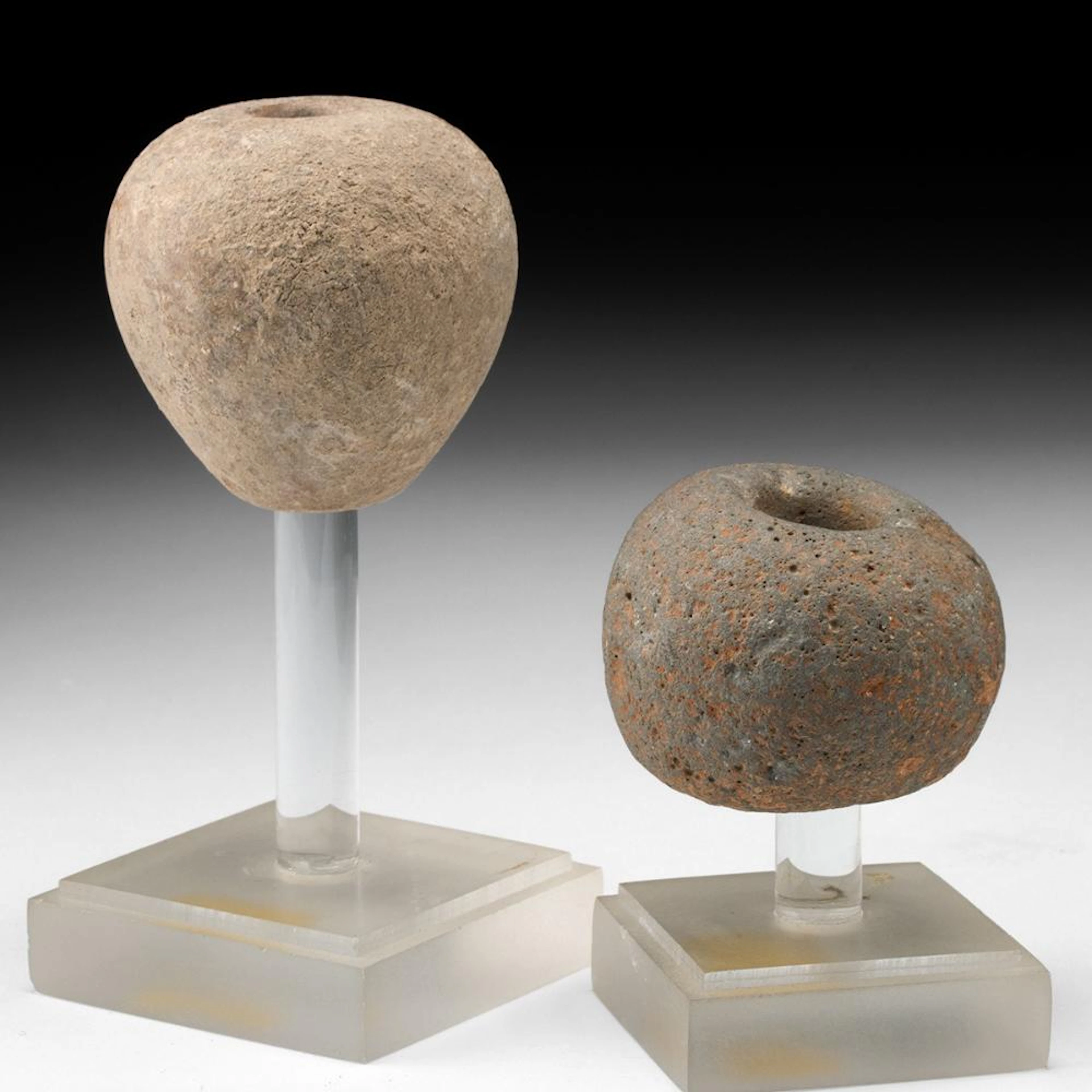 Two Predynastic Egyptian Stone Mace Heads on Custom Stands