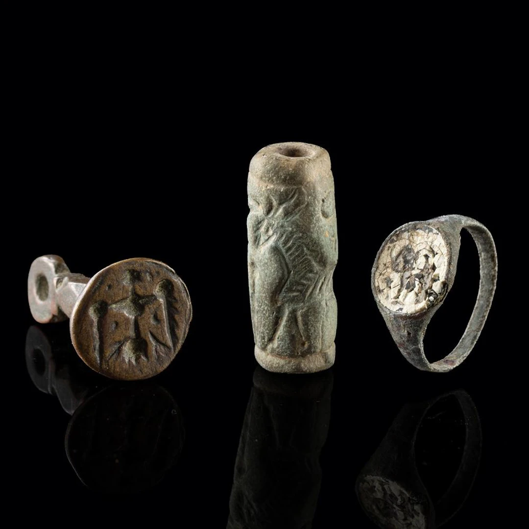 Mesopotamian Cylinder Seal Bead, Scythian Eagle Fob, & Roman Ring (3 Pcs)