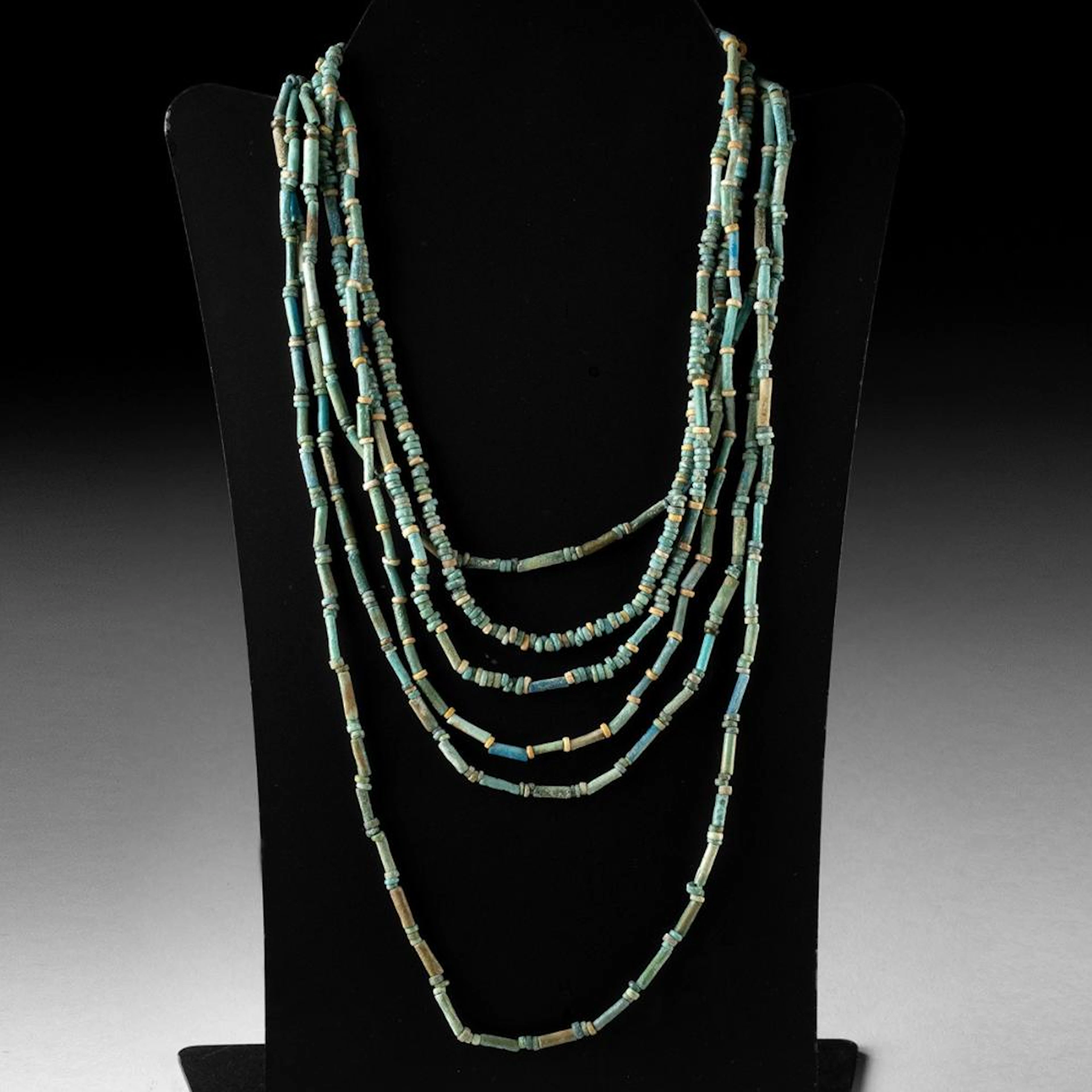 Two Egyptian Faience Tri-Strand Bead Necklaces, Late Period to Roman