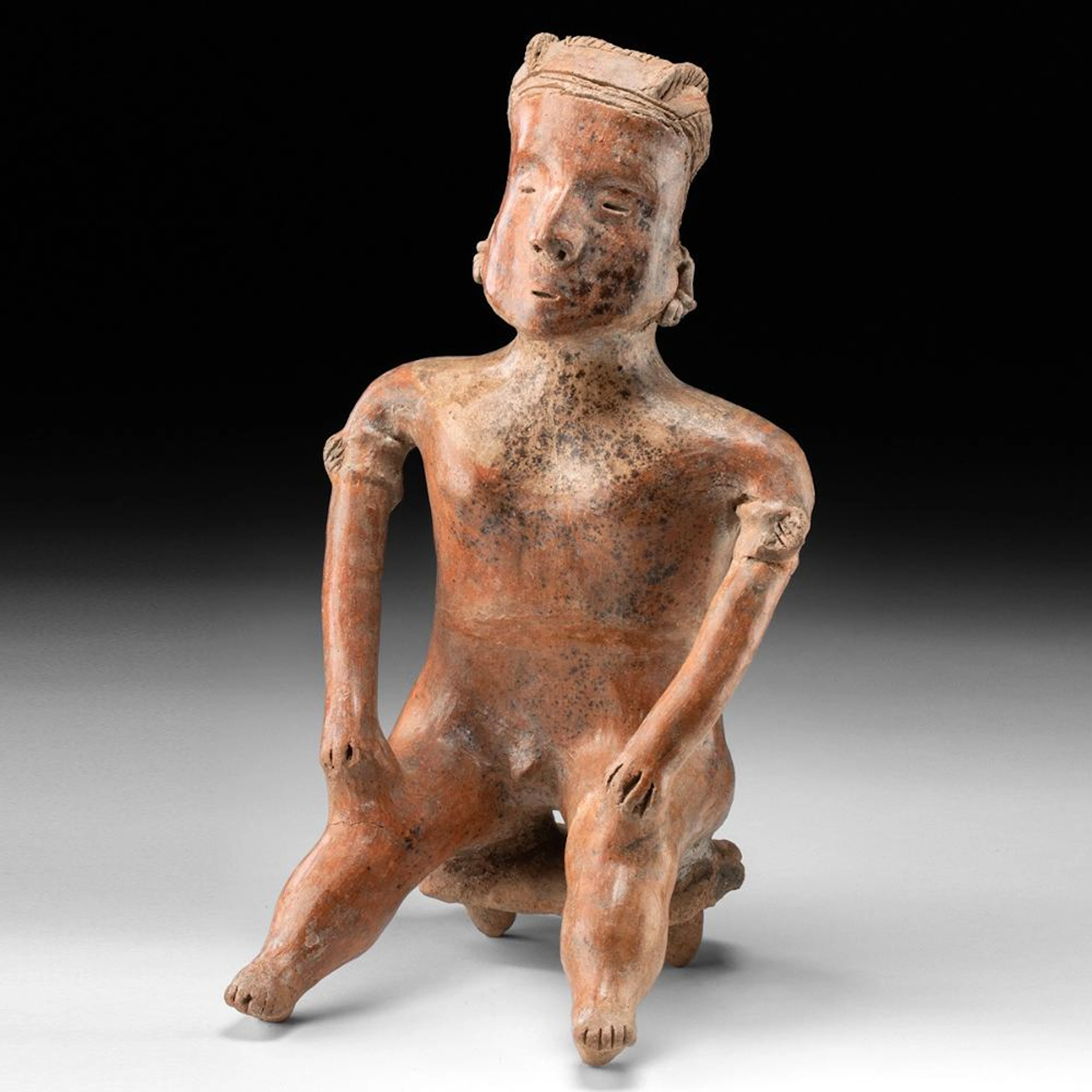 Nayarit Pottery Seated Nude Male Figure on Stool with Headdress