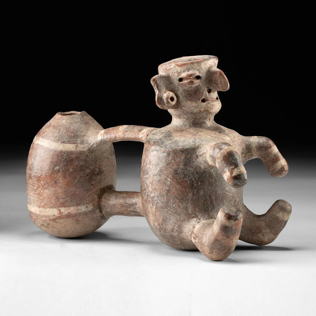 Vicus Double Chambered Whistling Vessel, Seated Figure with Hooked Nose