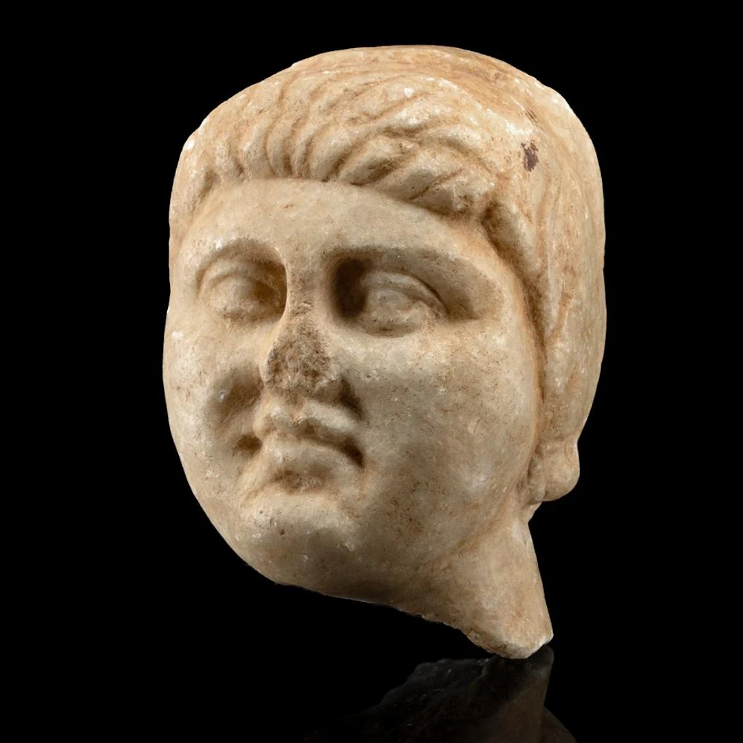 Roman Miniature Marble Head of a Youth with Cap