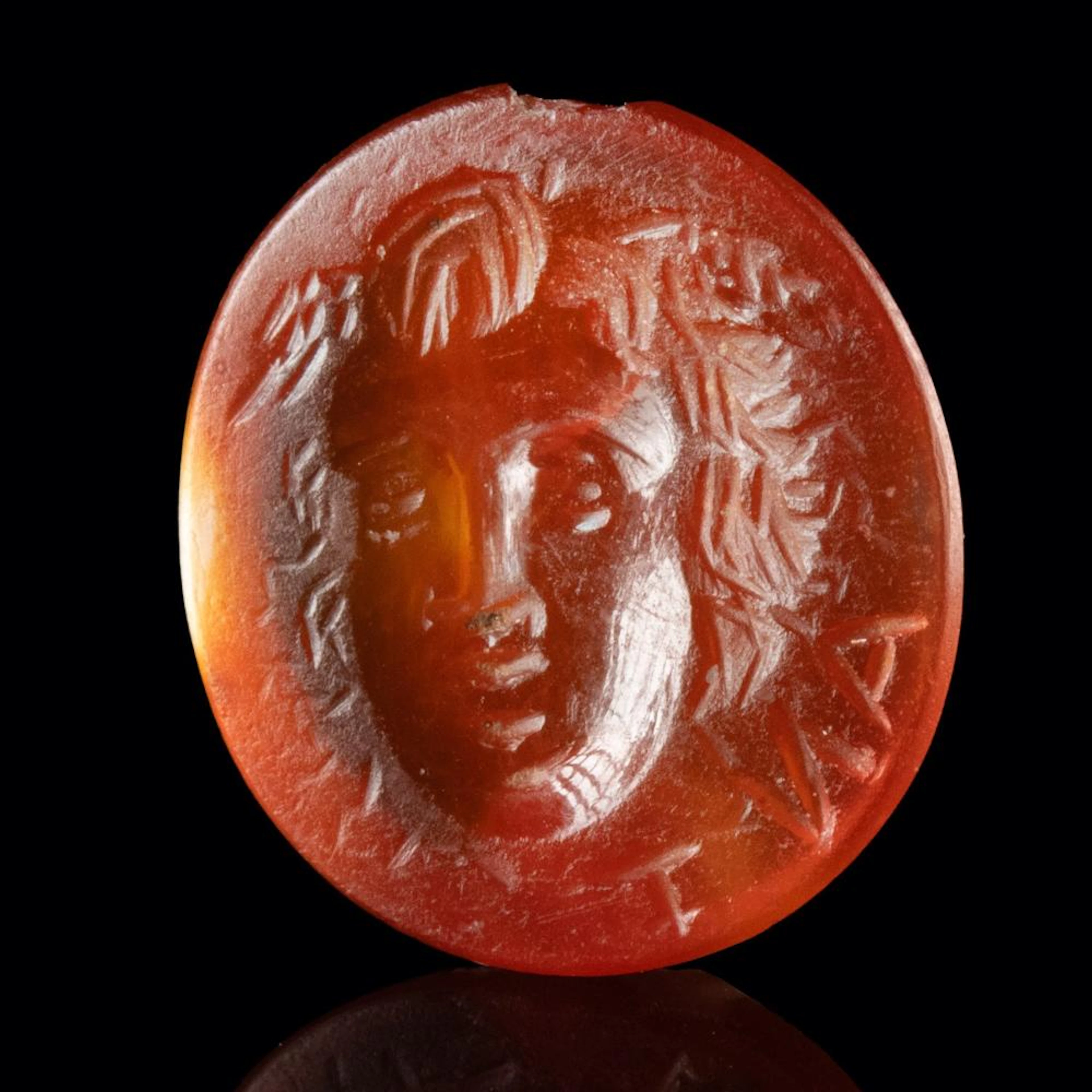 Roman Carnelian Gorgoneion Intaglio with Winged Medusa, Inscribed ANT