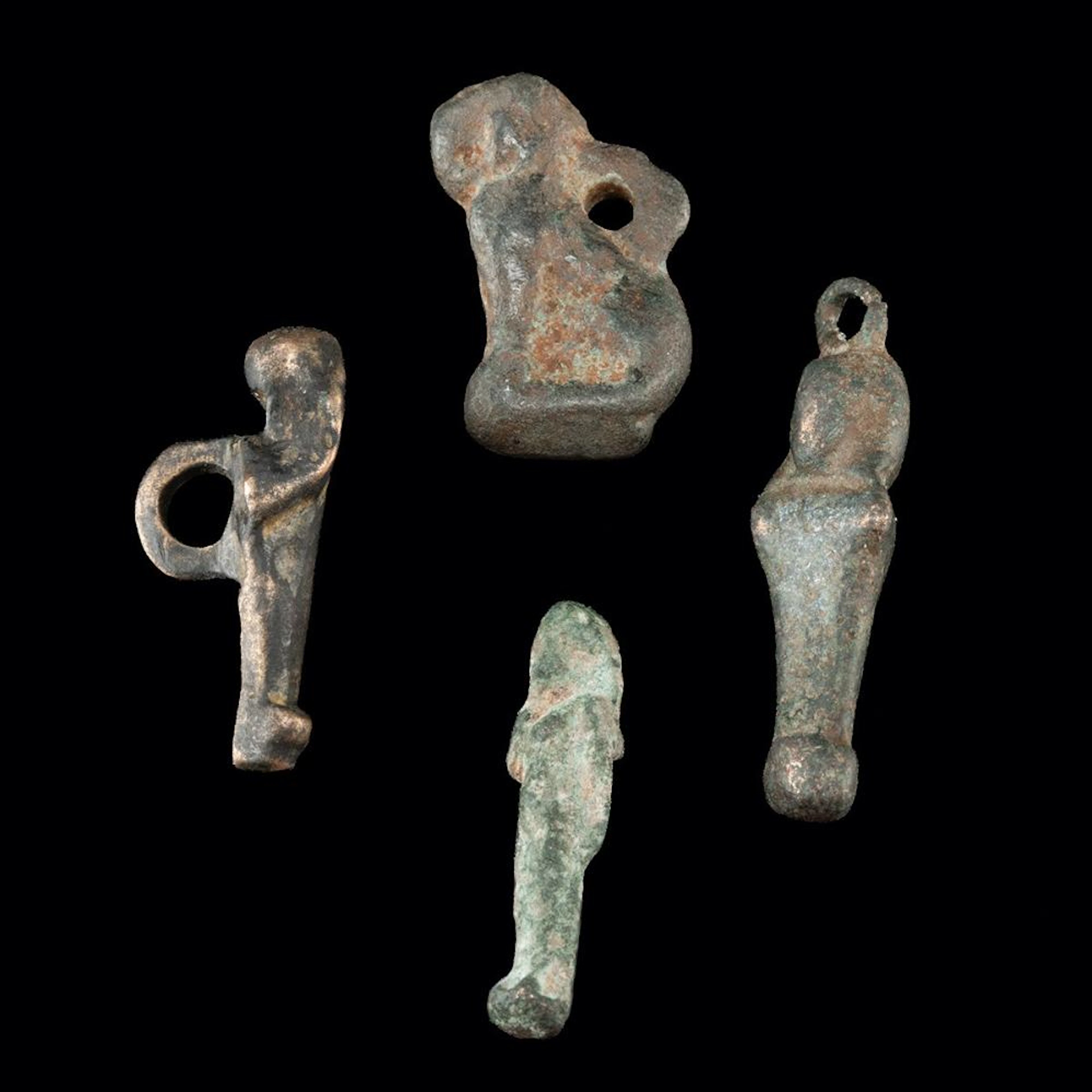 Romano-Egyptian Bronze Harpocrates and Sphinx Amulet Group, 4 Pendants
