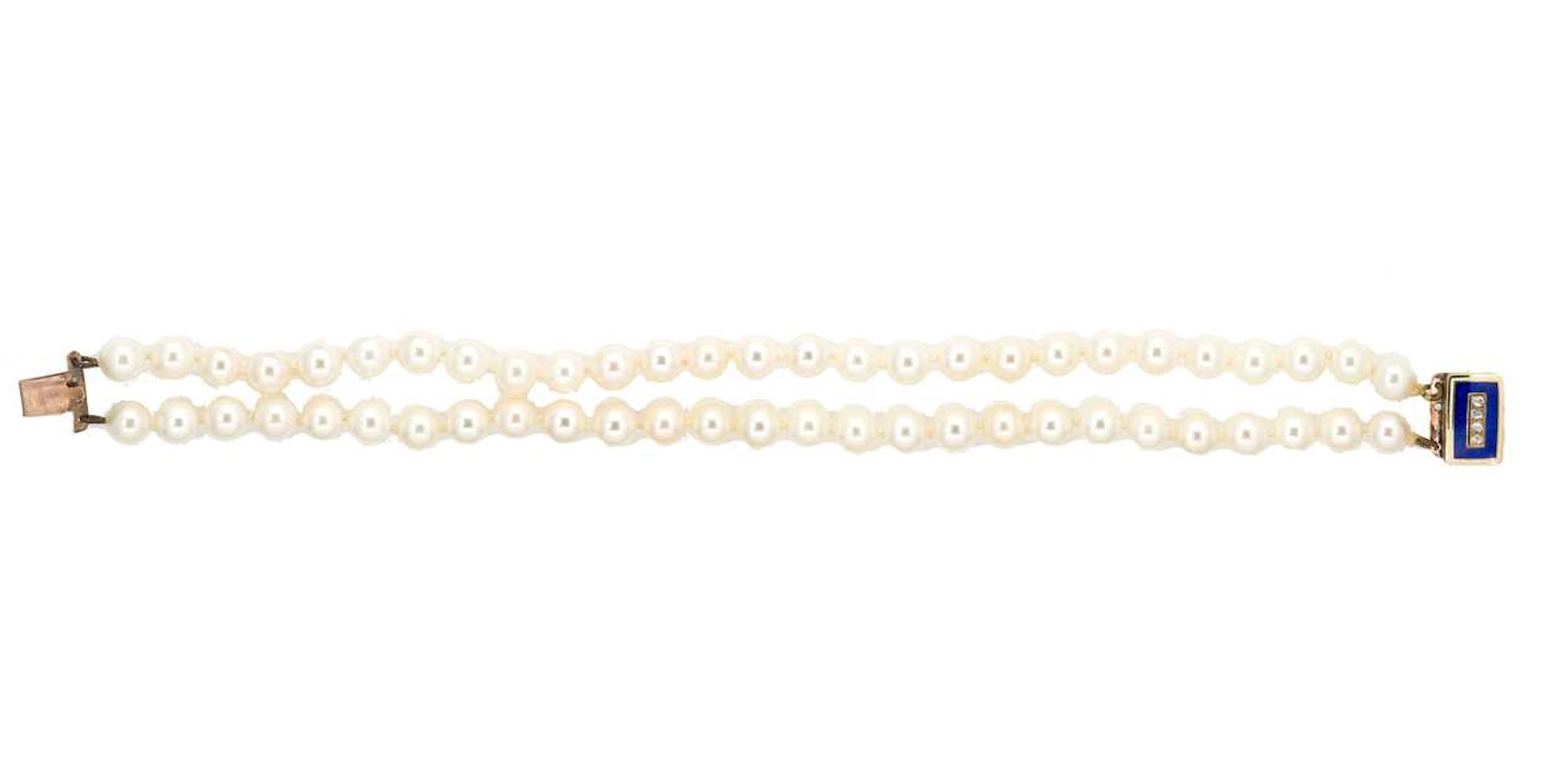 A double row cultured pearl bracelet with enamel clasp