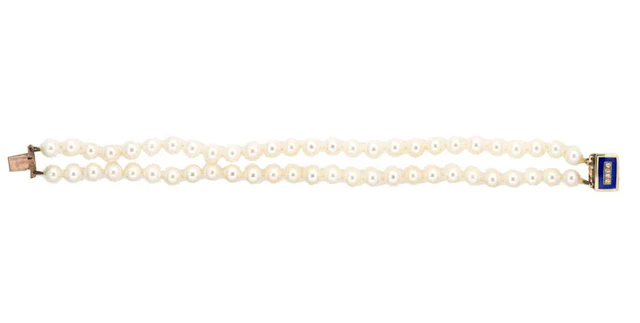 A double row cultured pearl bracelet with enamel clasp