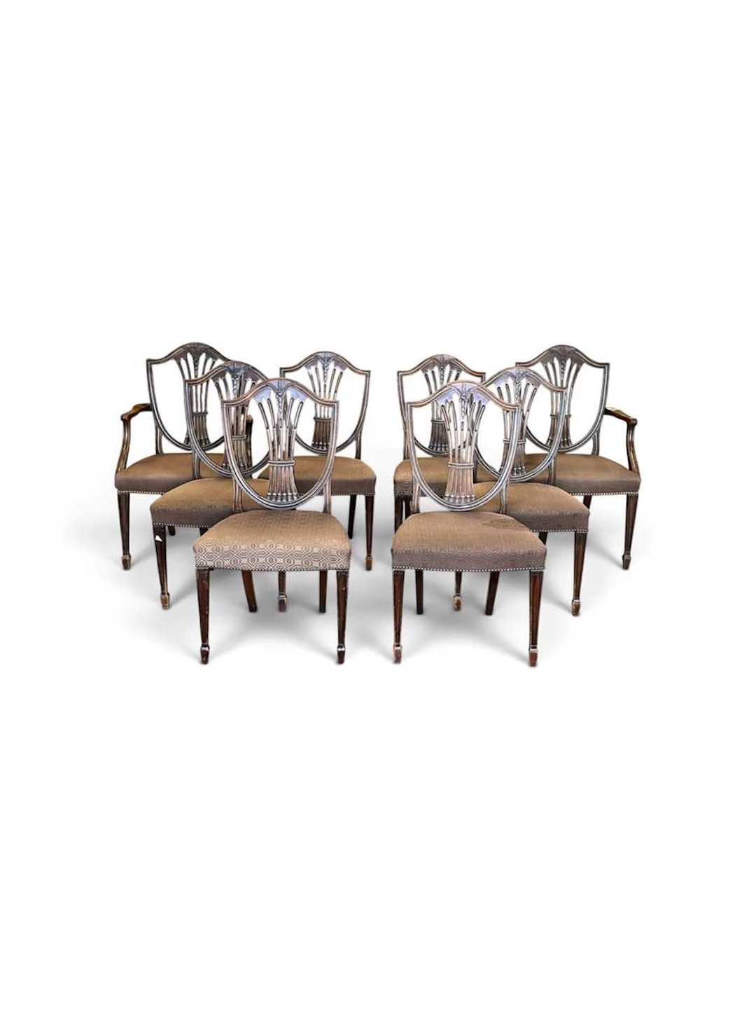 A set of eight George III style mahogany dining chairs