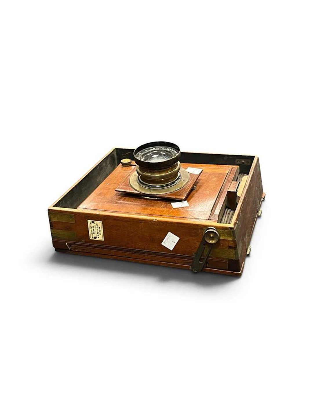 A mahogany plate camera body with 'Rouch Patent' plaque...
