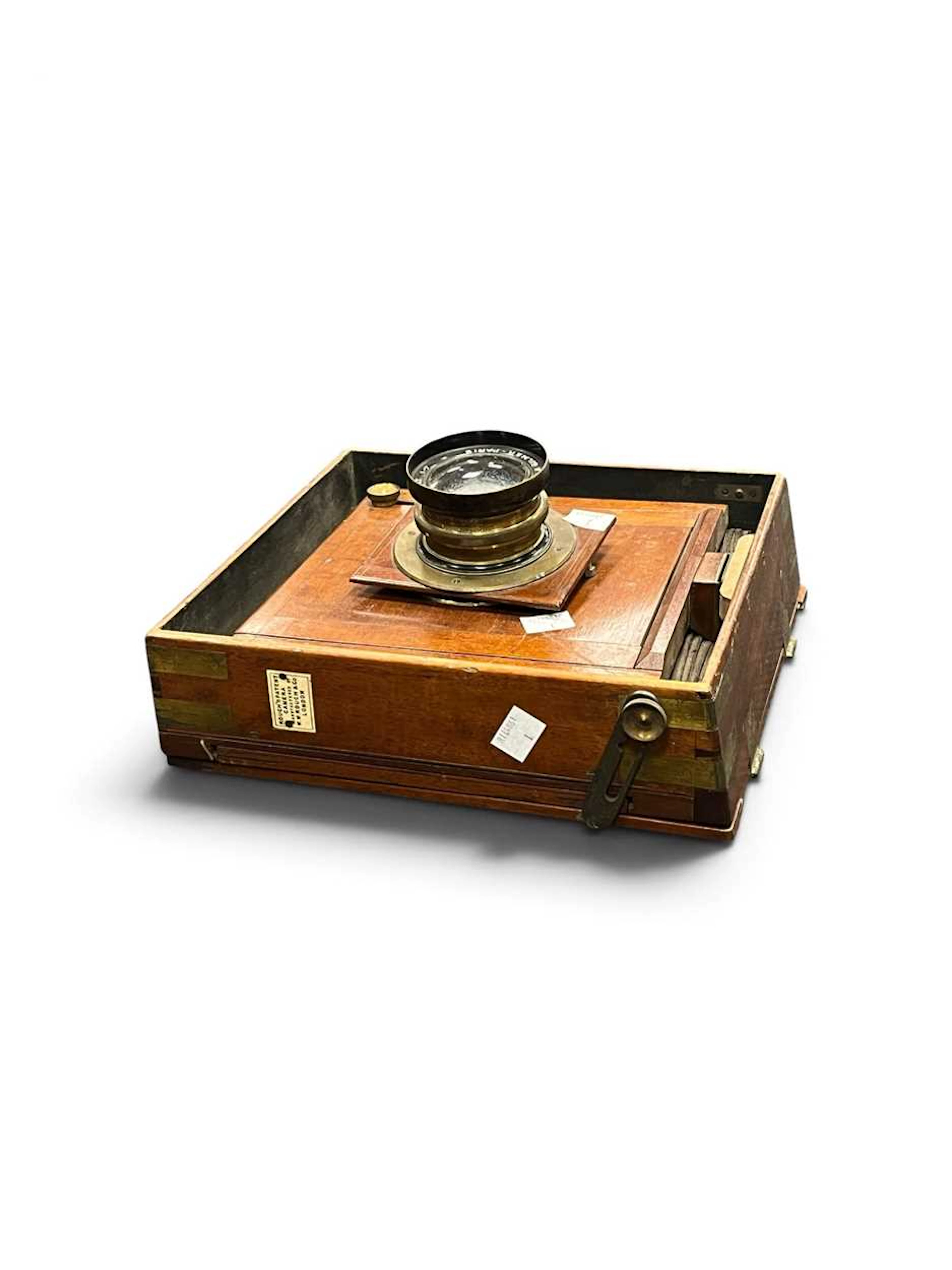 A mahogany plate camera body with 'Rouch Patent' plaque...