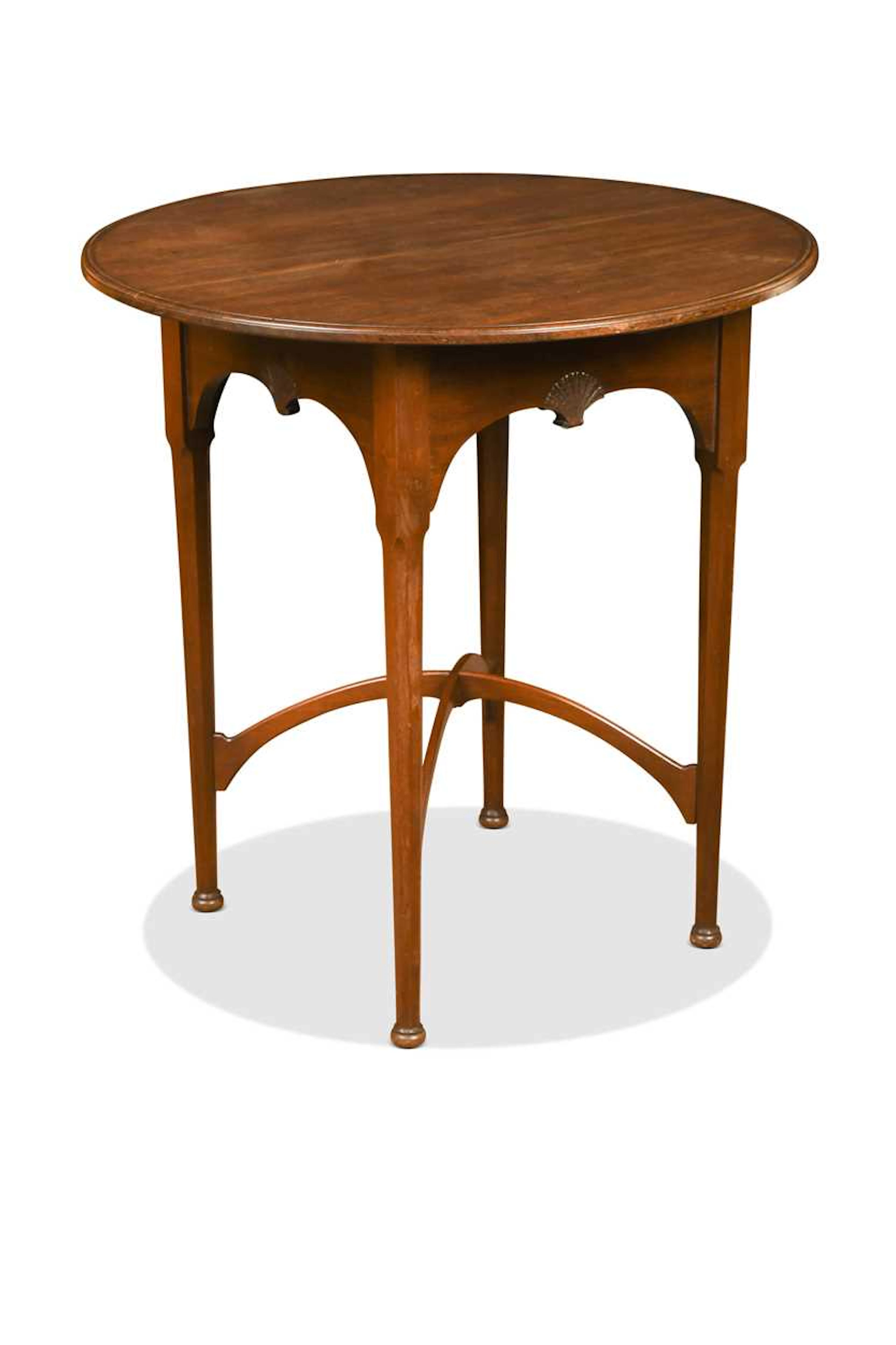 An Arts & Crafts mahogany occasional table