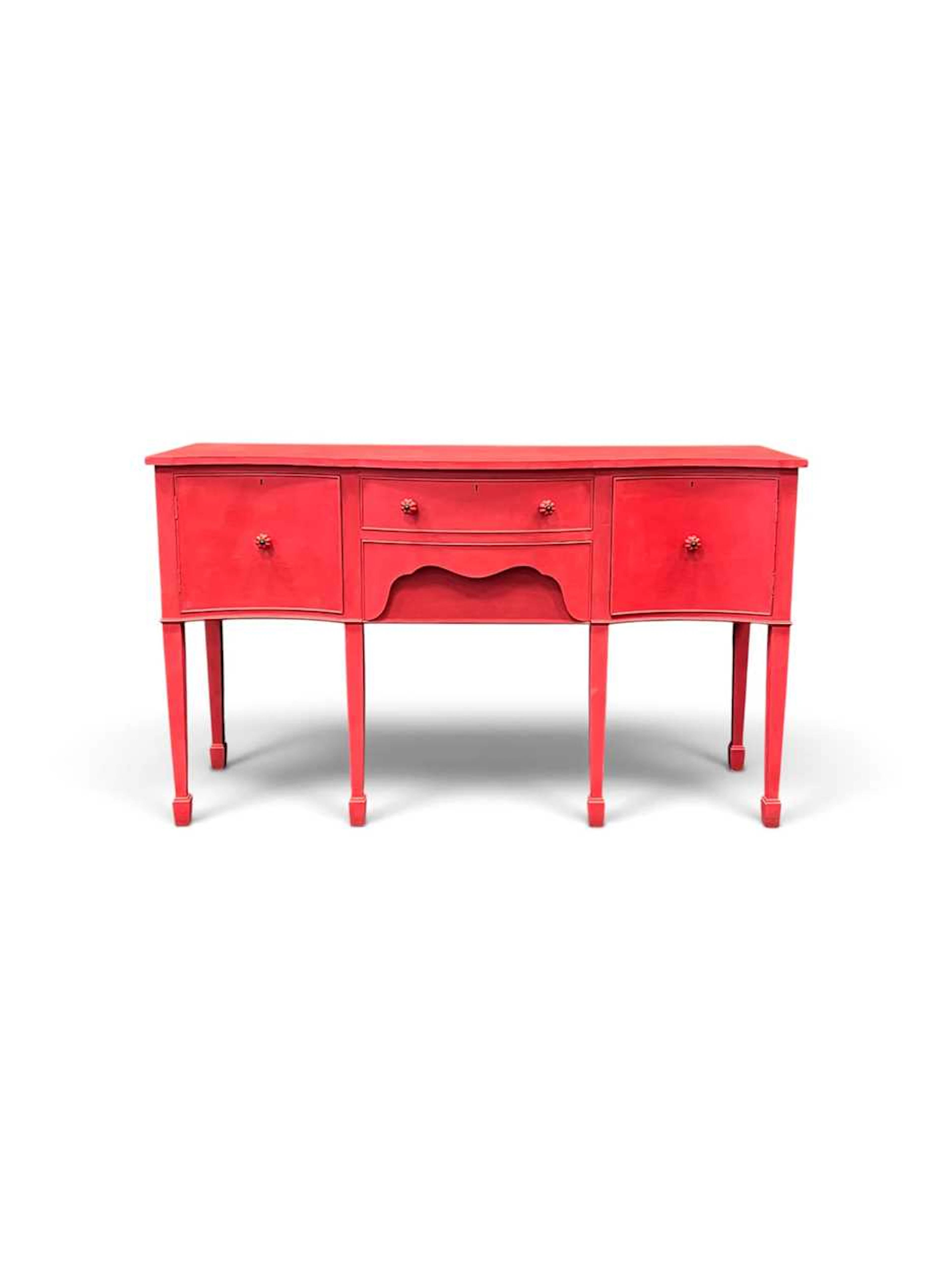 A Regency style red painted side board