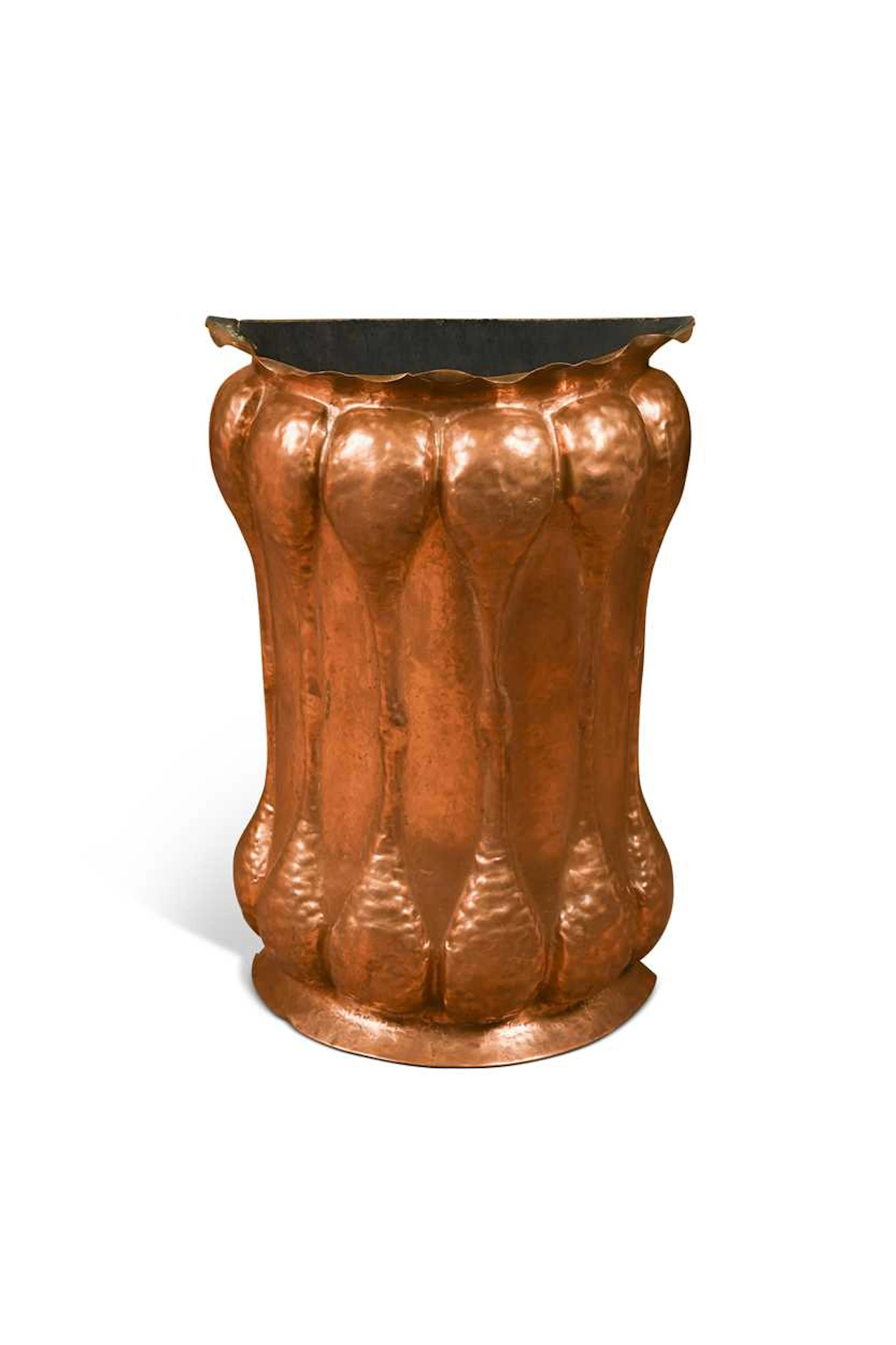An Arts & Crafts copper stick stand
