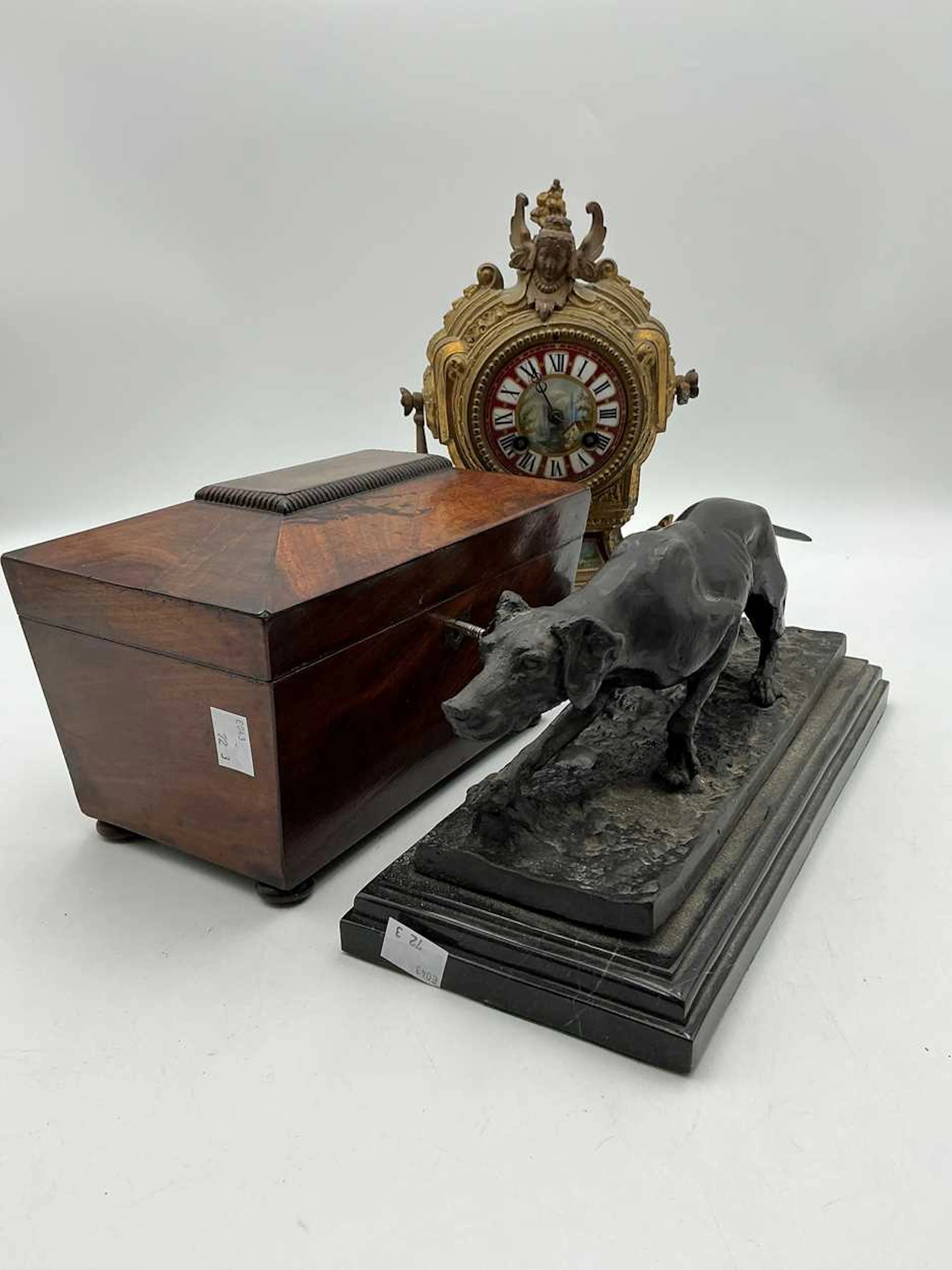 Sculpture of a spelter prowling hunting dog set on black marble base