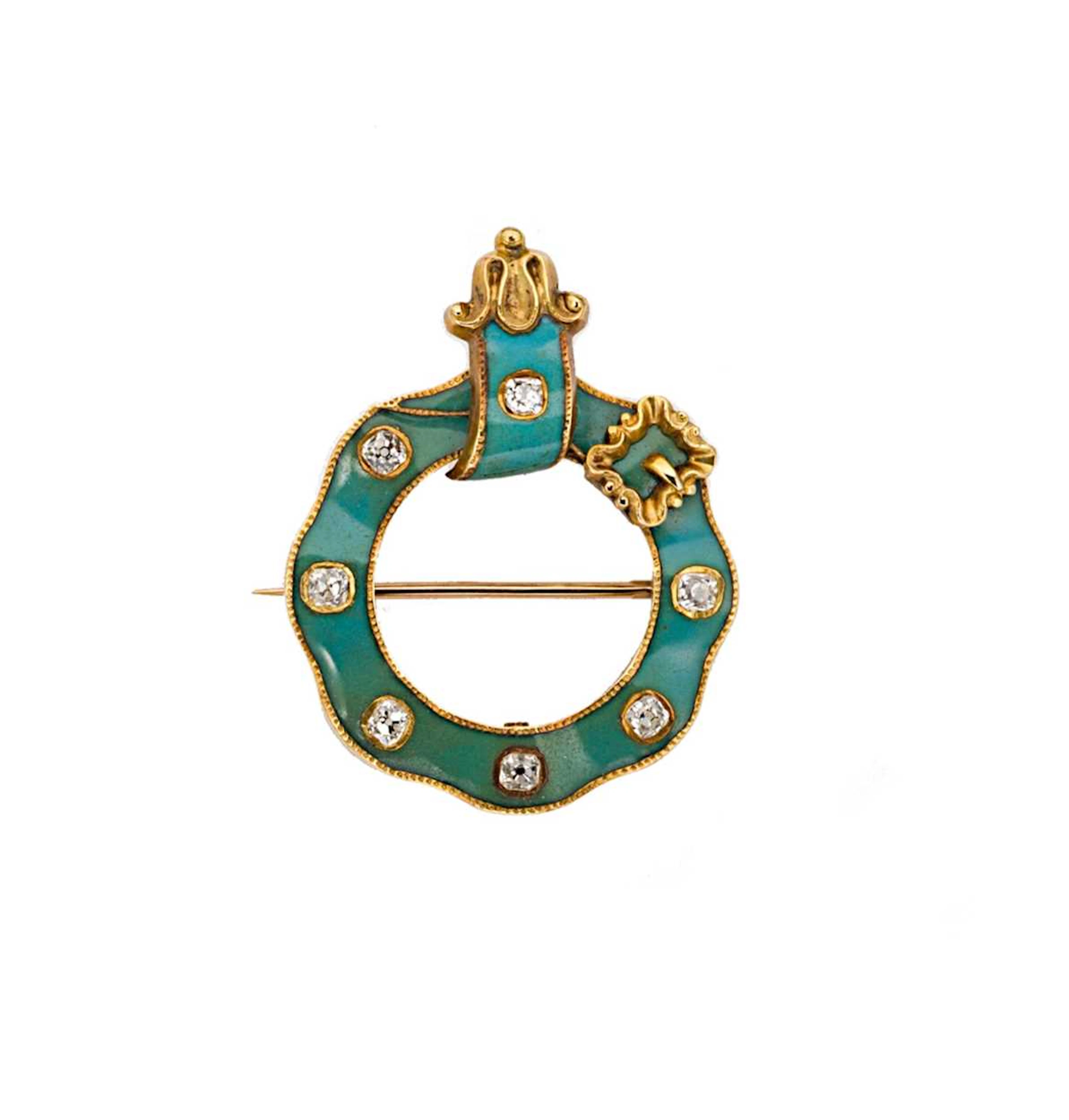 A Victorian diamond and enamel buckle brooch