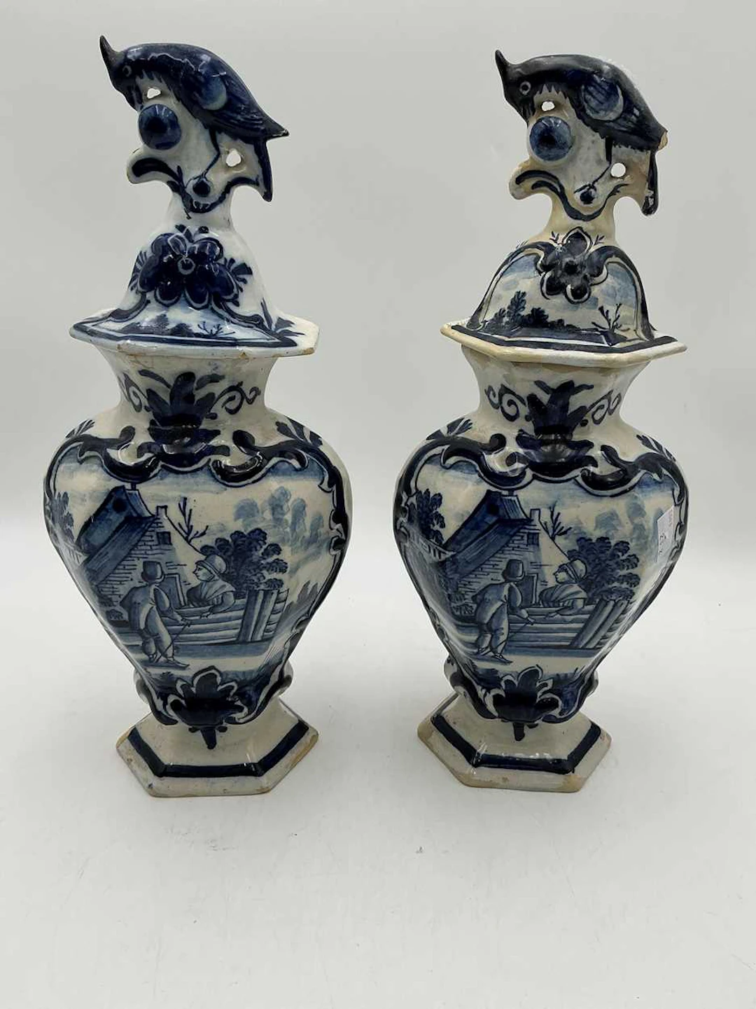 Pair of late 19th century delft lidded baluster vases the...