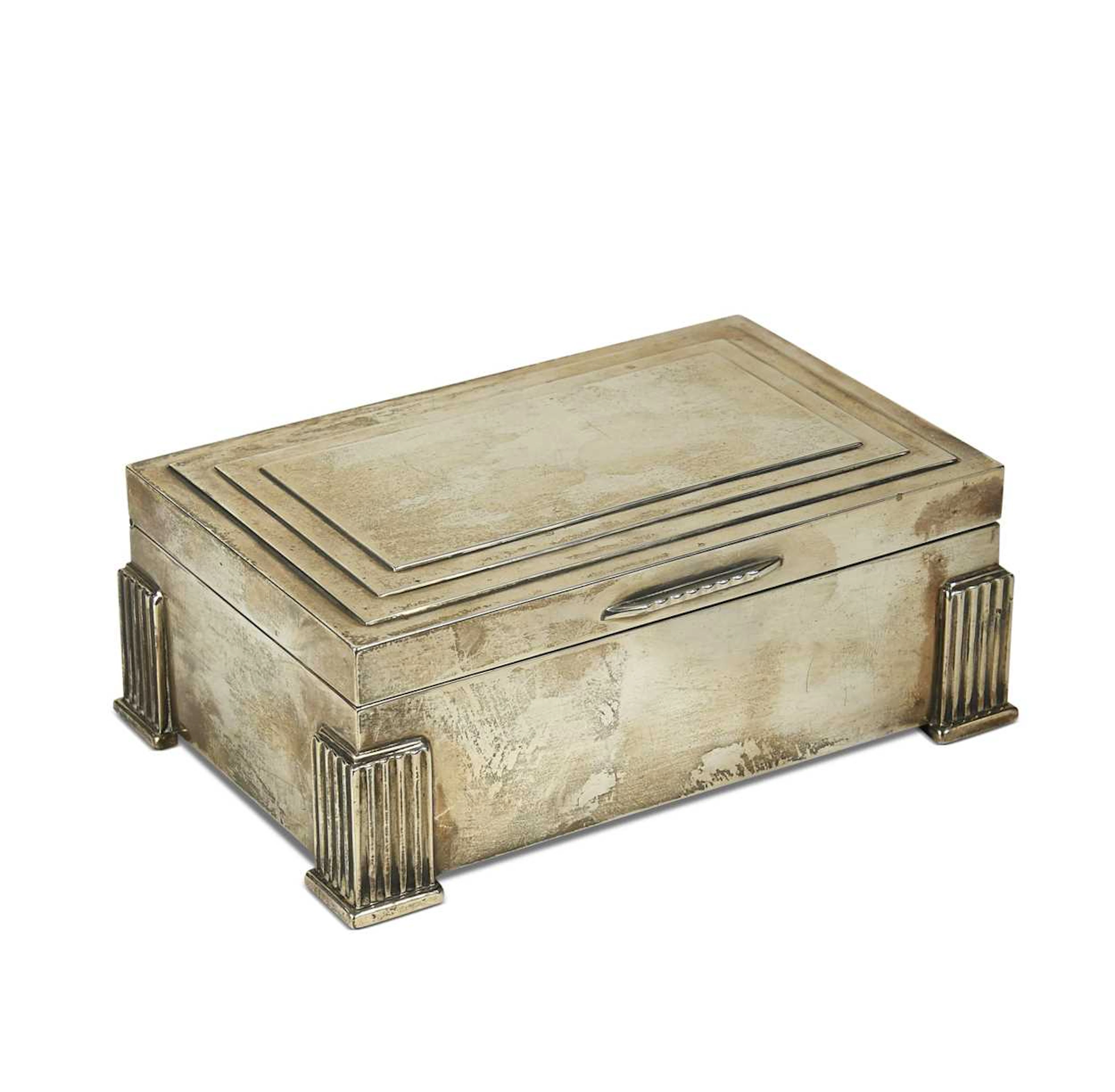 An Art Deco silver cigarette box by Adie Bros. Ltd.