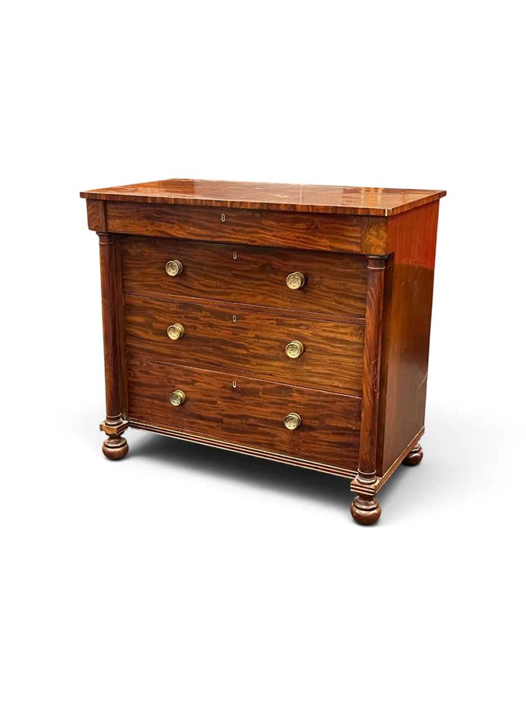 A mahogany chest of drawers