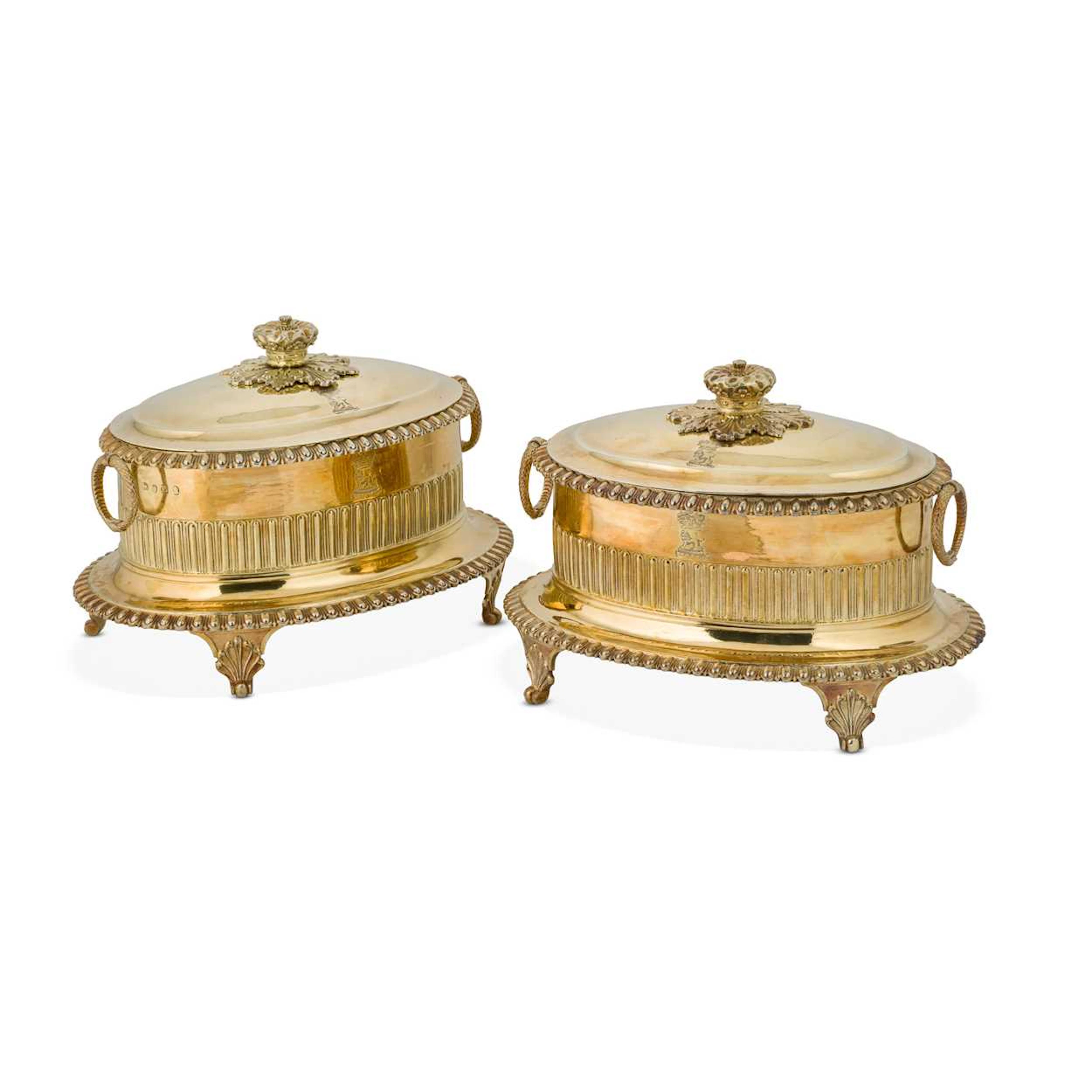 A pair of George III silver gilt covered butter bowls and covers