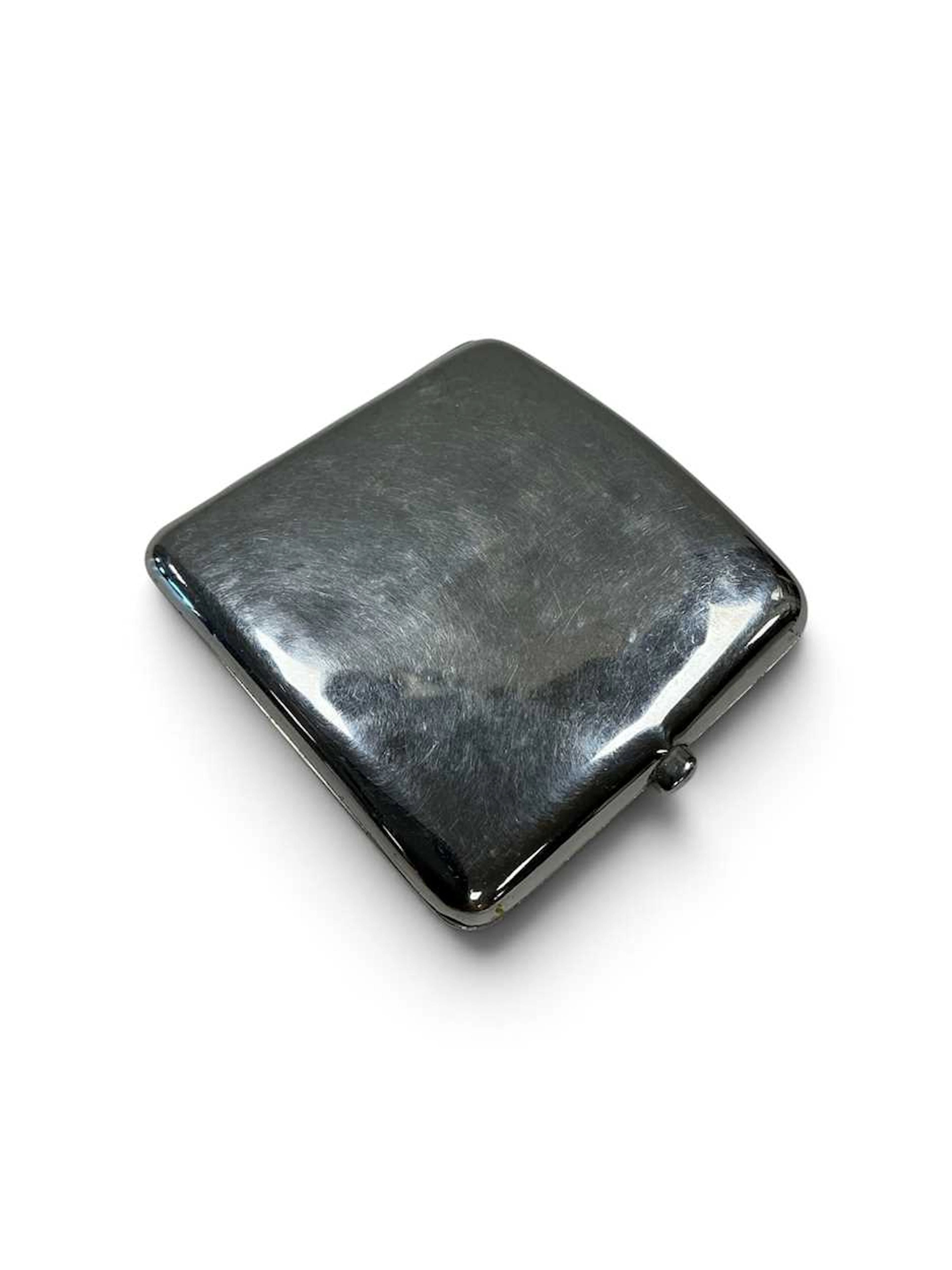 A silver cigarette case
