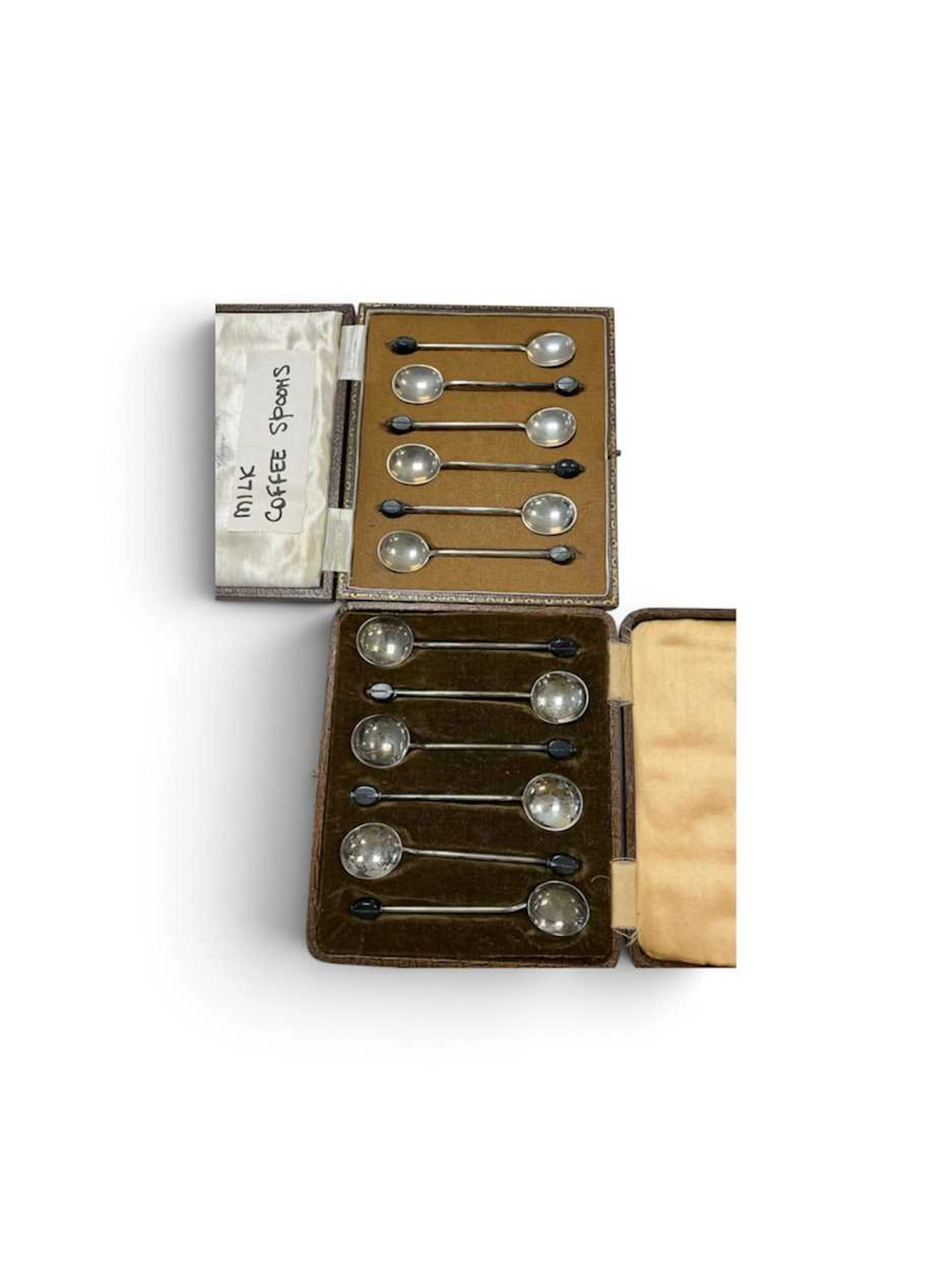 Two sets of boxed George V silver coffee spoons
