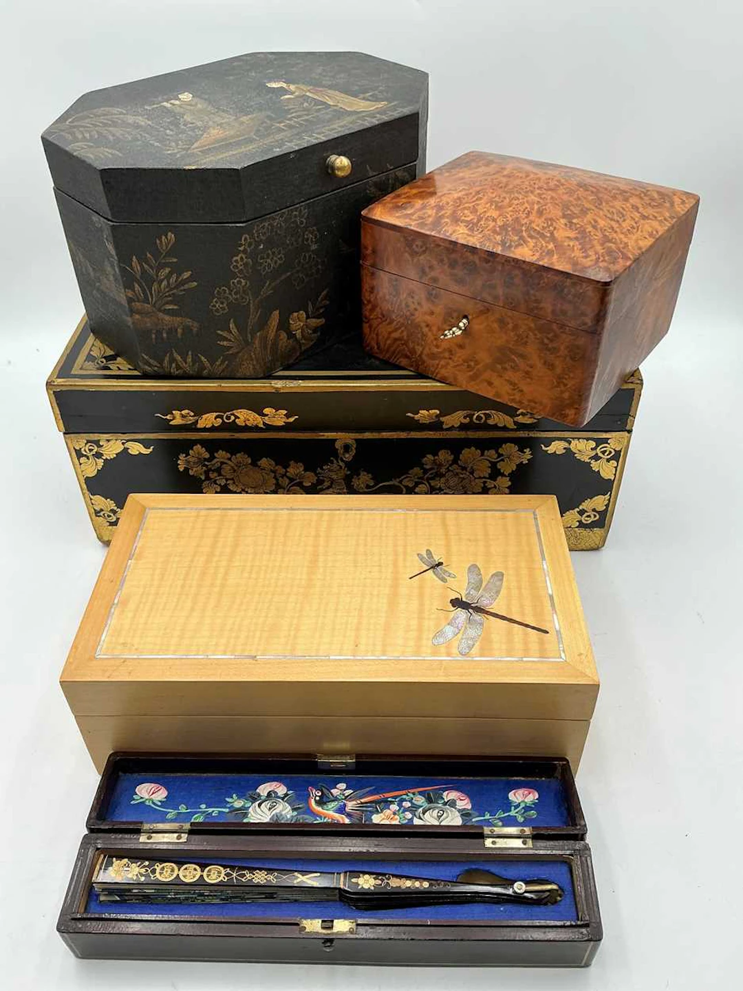 A Burmese black and gilt decorated lacquer box with...