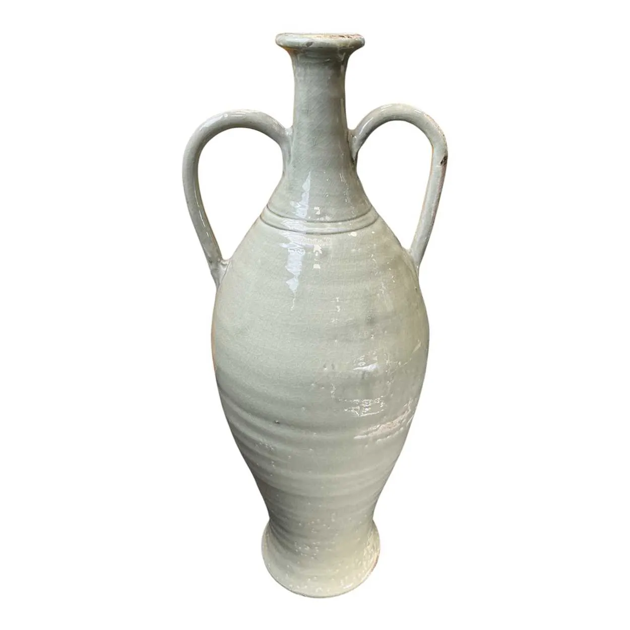 A very large two handled ewer or oil storage jar in celadon glaze 62cm High