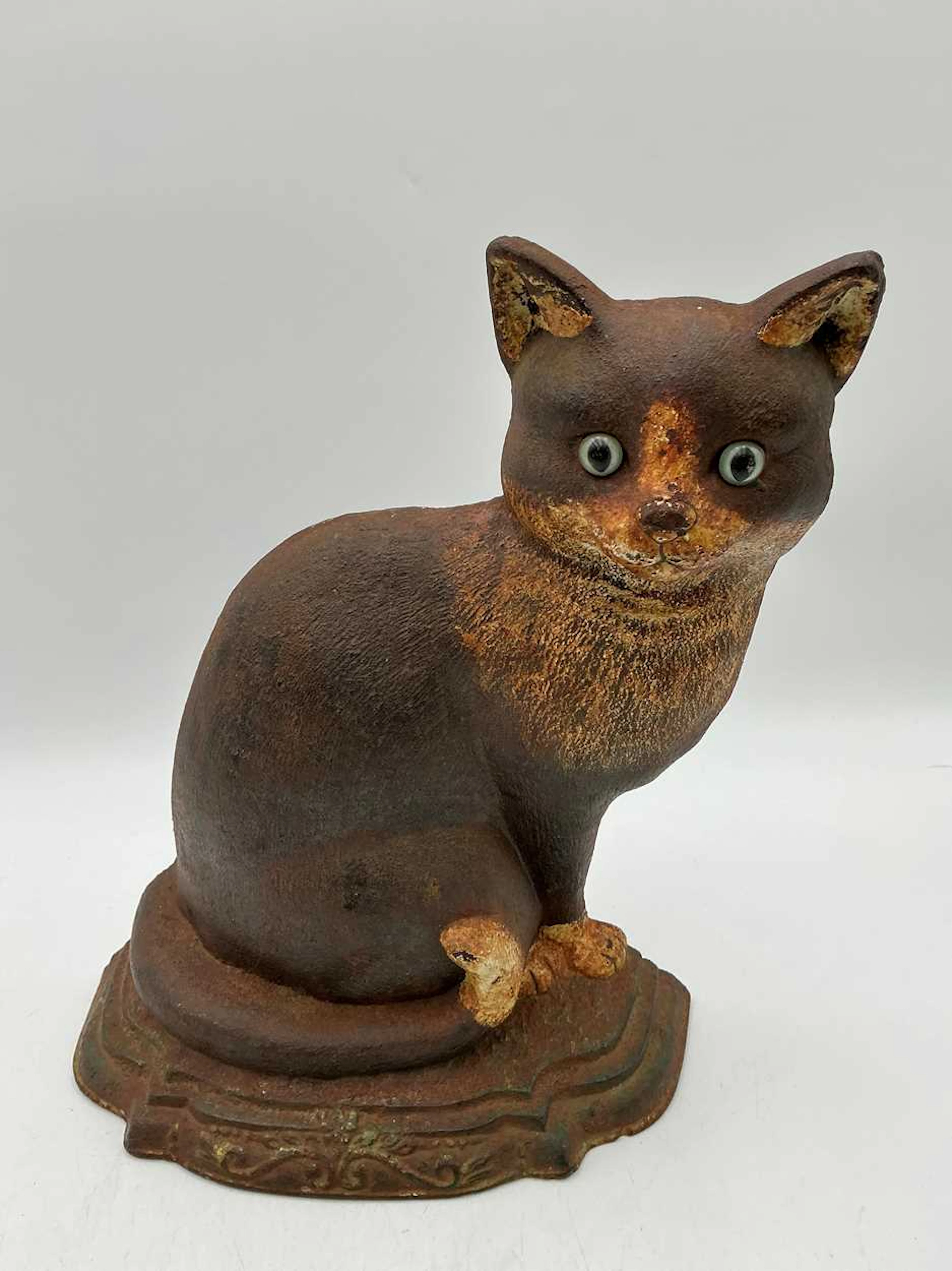 A cast iron door stop