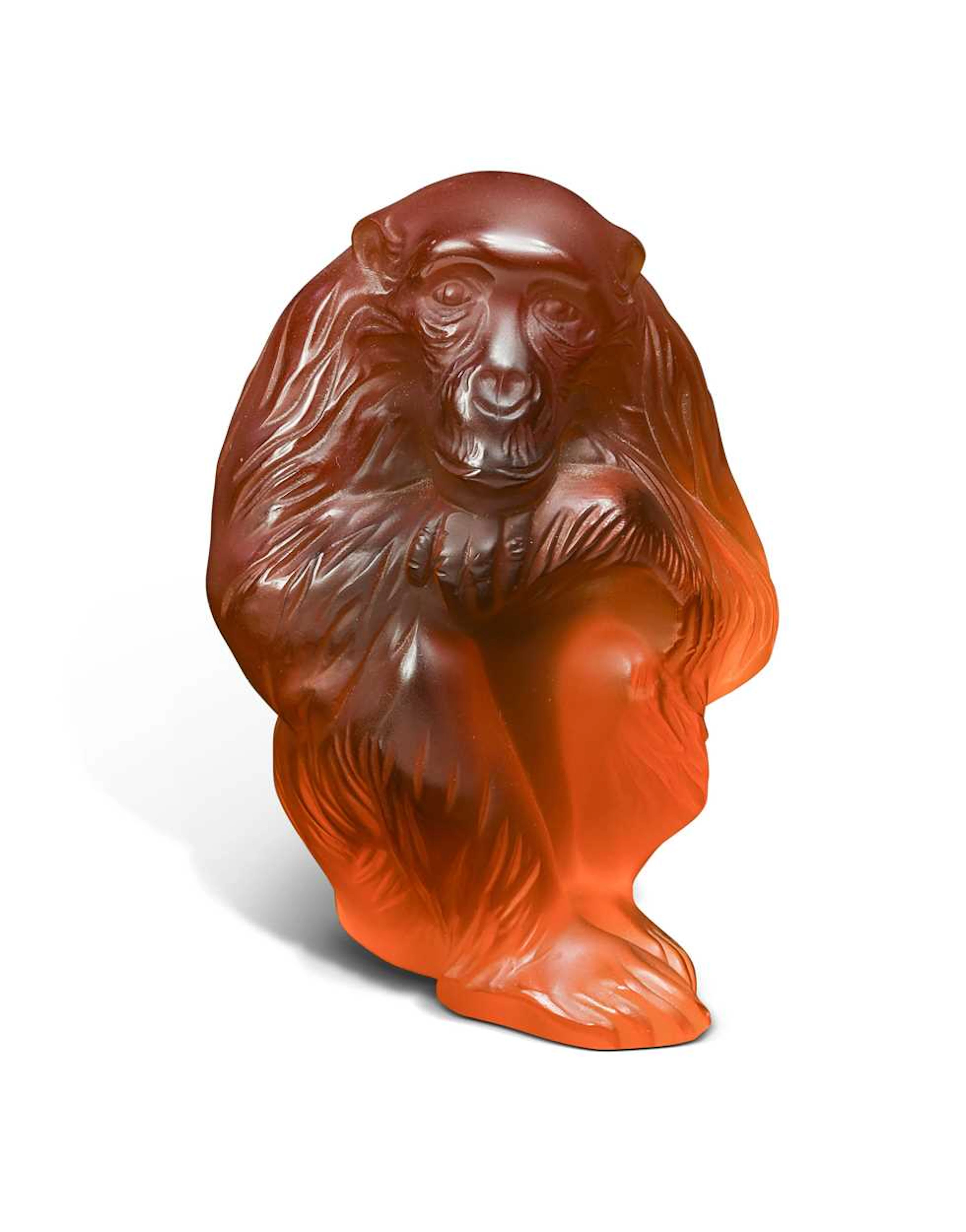 Chita, a modern Lalique amber glass model of a chimpanzee