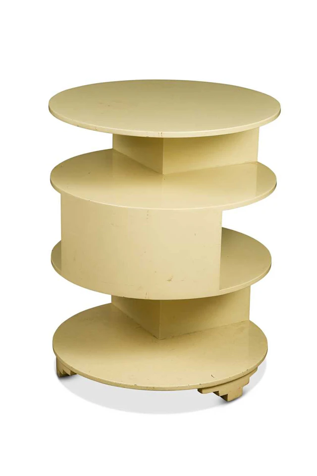 An Art Deco painted asymmetrical book table