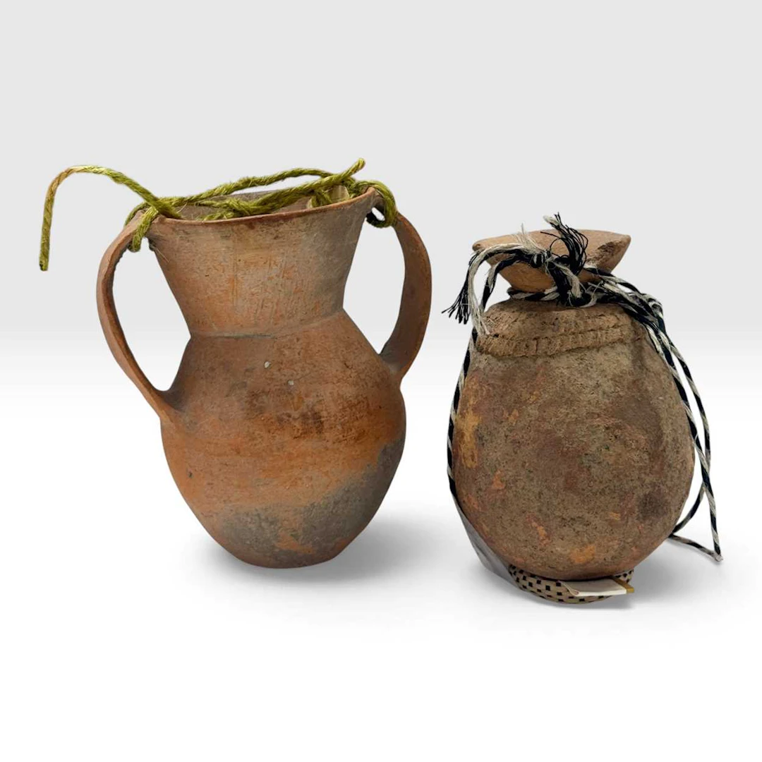A Chinese terracotta two-handled vase, probably Neolithic, Qijia Culture