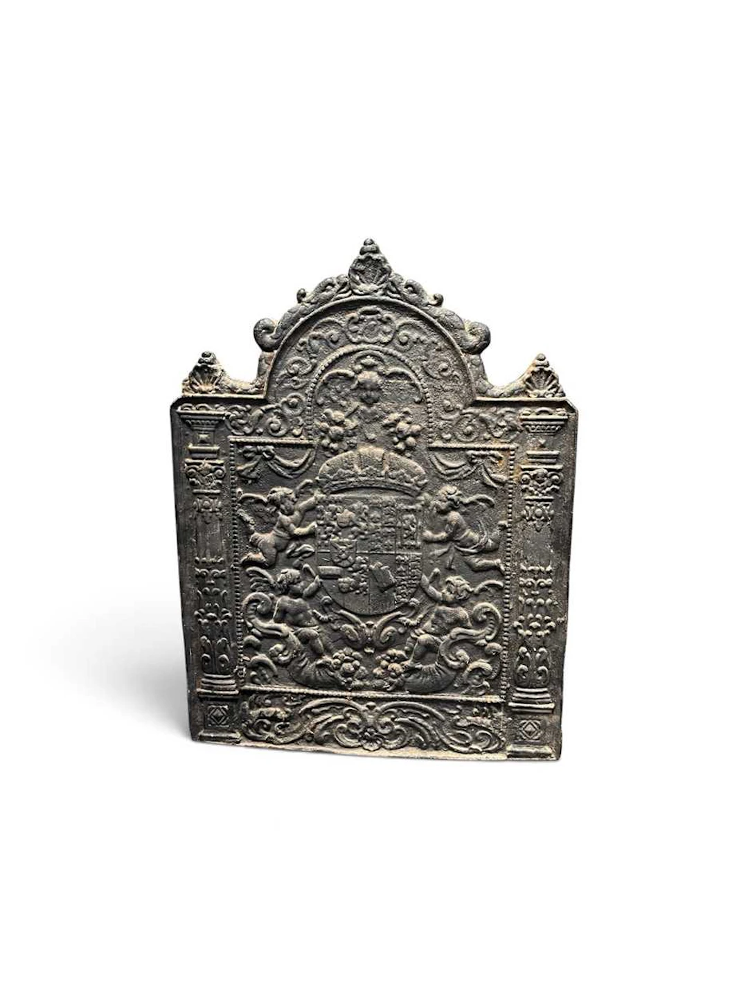 A very large cast iron fireback with armorial crest flanked by putti