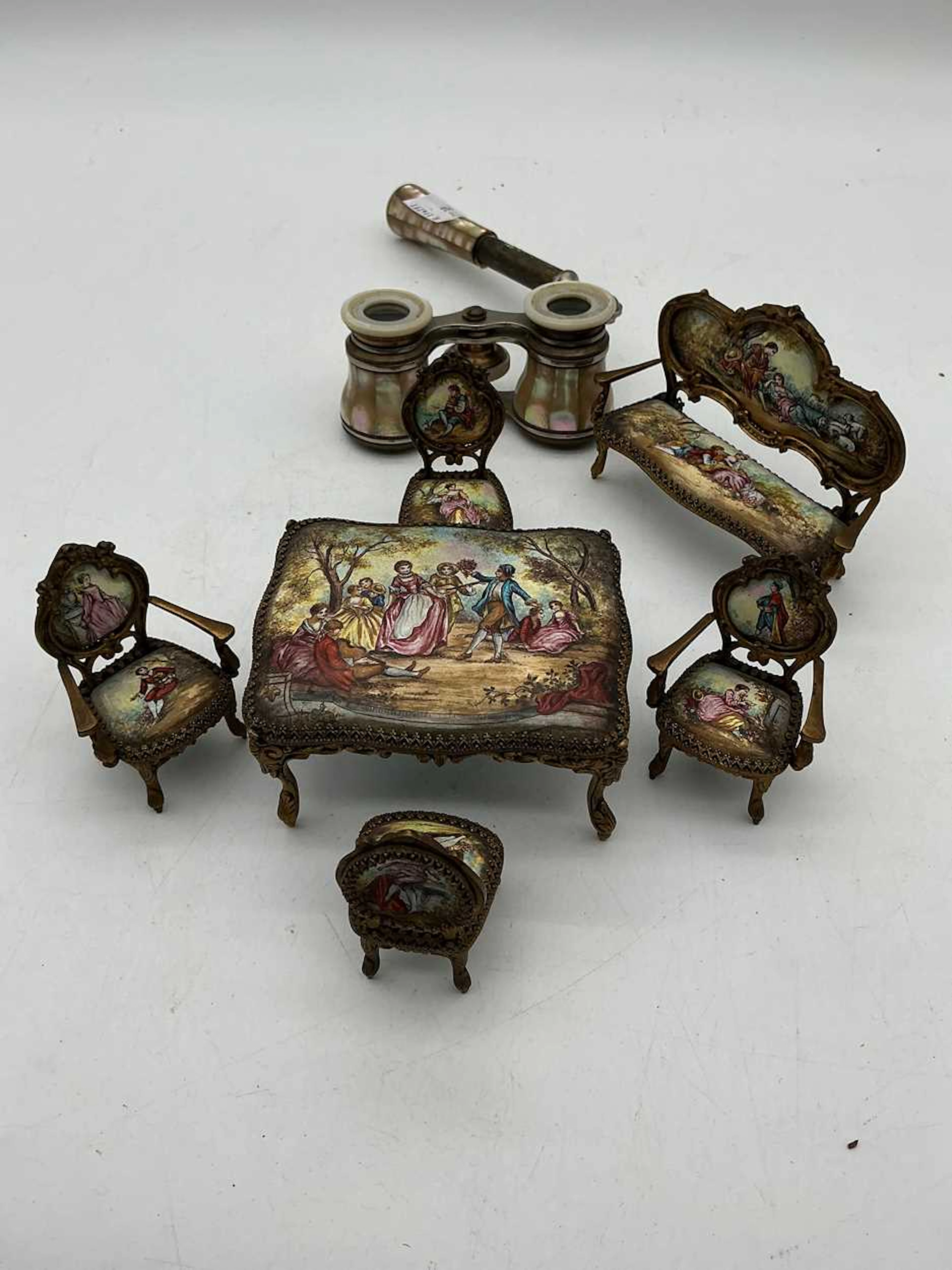 A decorative set of enamelled dolls house furniture in...