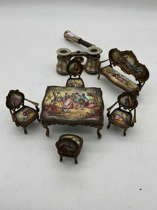 A decorative set of enamelled dolls house furniture in...