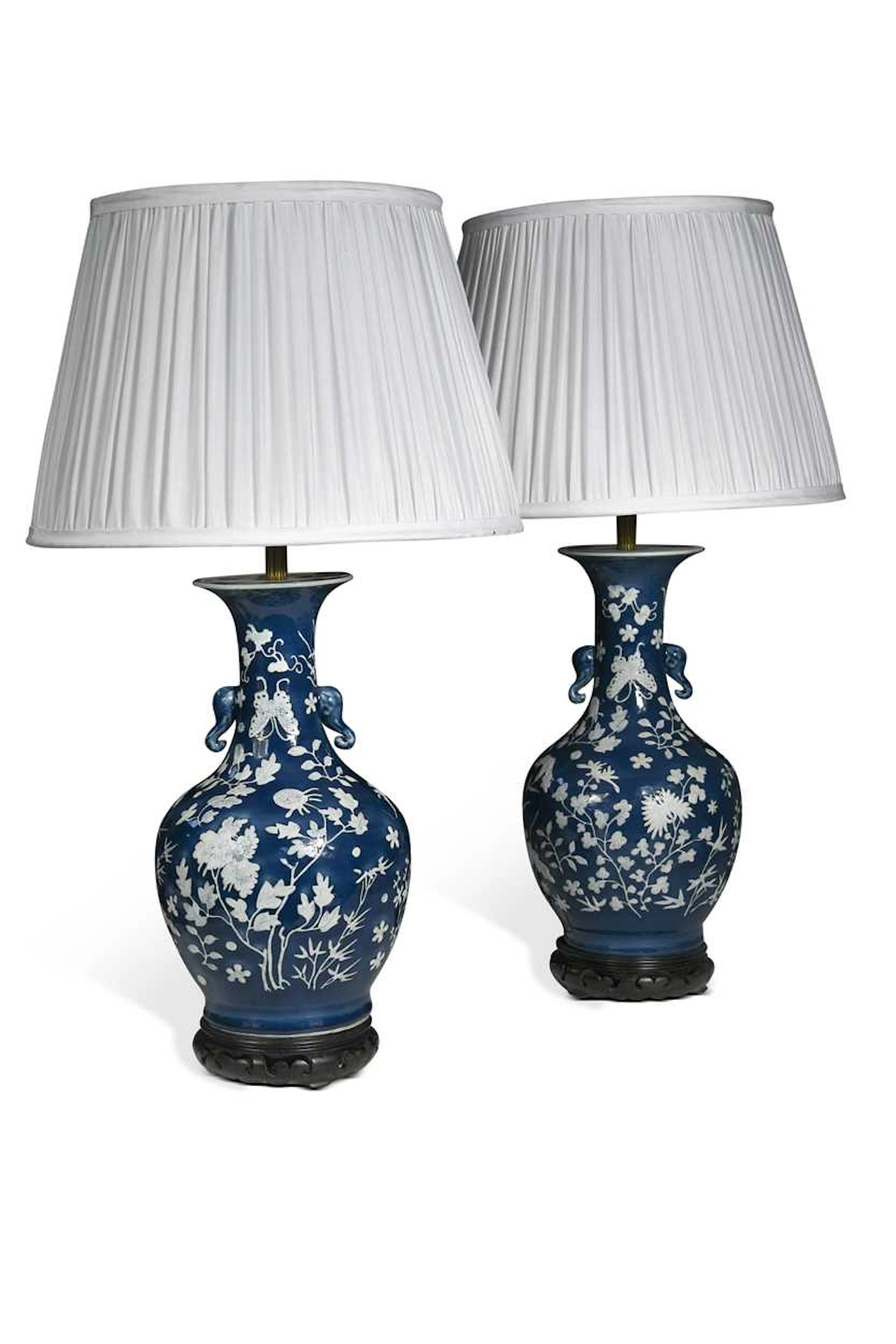 A pair of Chinese blue ground and slip decorated vases, early 20th century