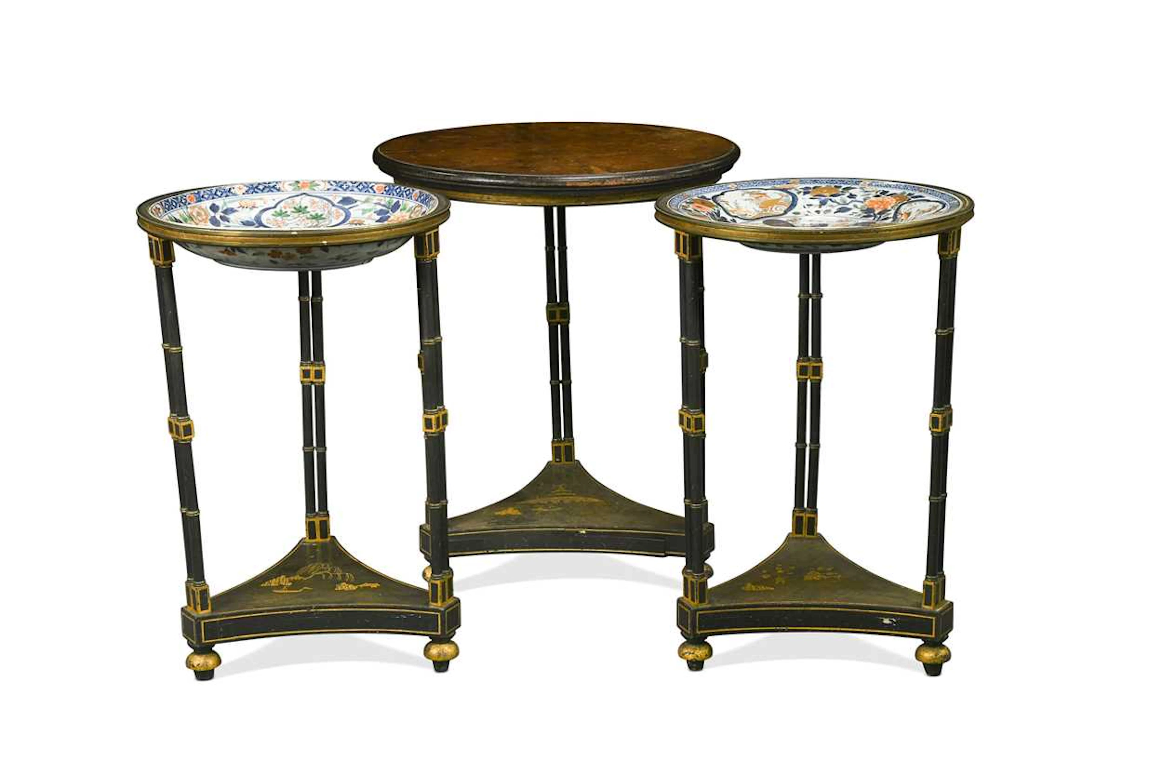 A pair of Regency lacquered circular dish stands