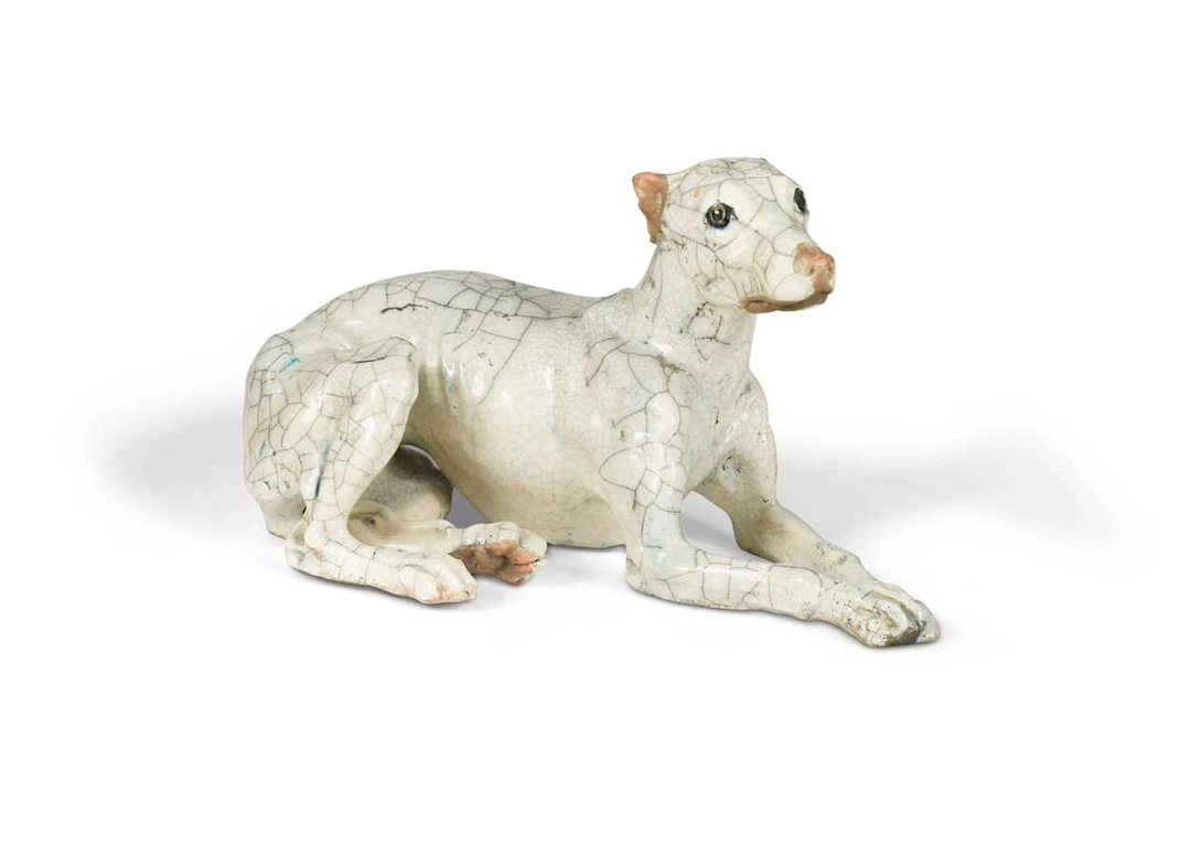 Keza Rudge (b. 1966), a raku-fired pottery model of a recumbent whippet